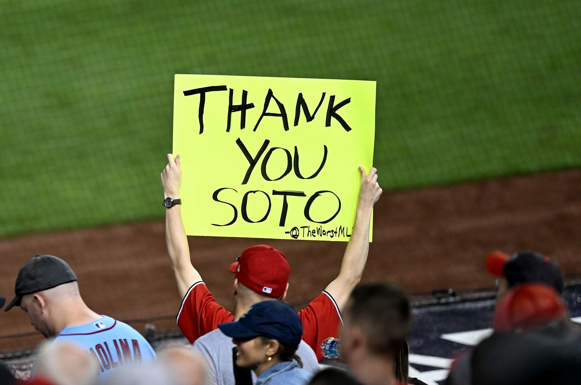 A fan holds up a sign for Juan Soto in a game at Nationals Park.