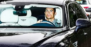 Cristiano Ronaldo arrives at Manchester United training looking dull as transfer saga continues