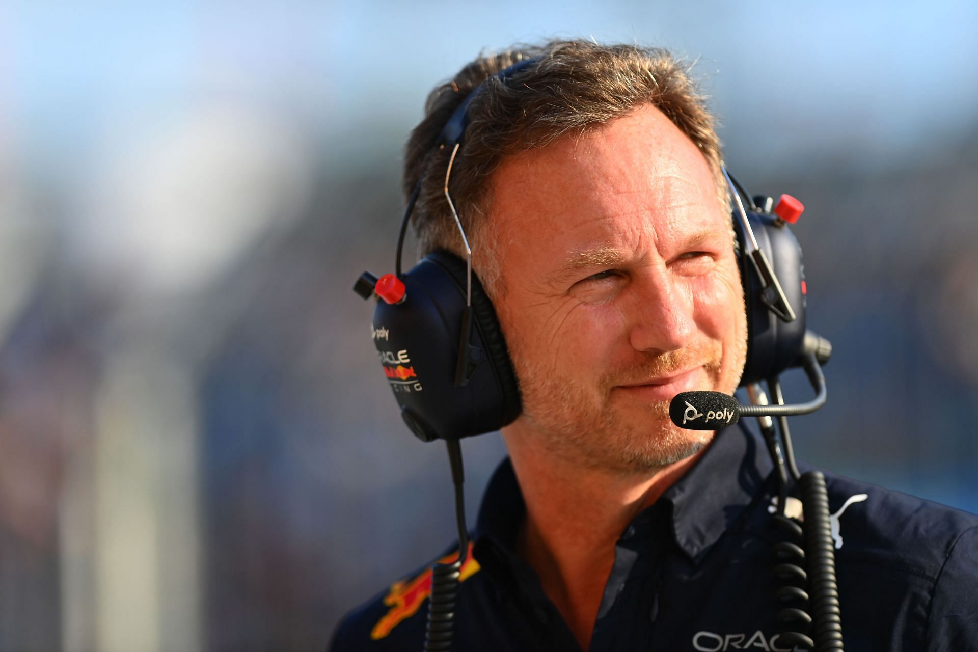 Red Bull team principal Christian Horner looks on in the paddock during the 2022 F1 Hungarian GP (Photo by Dan Mullan/Getty Images)