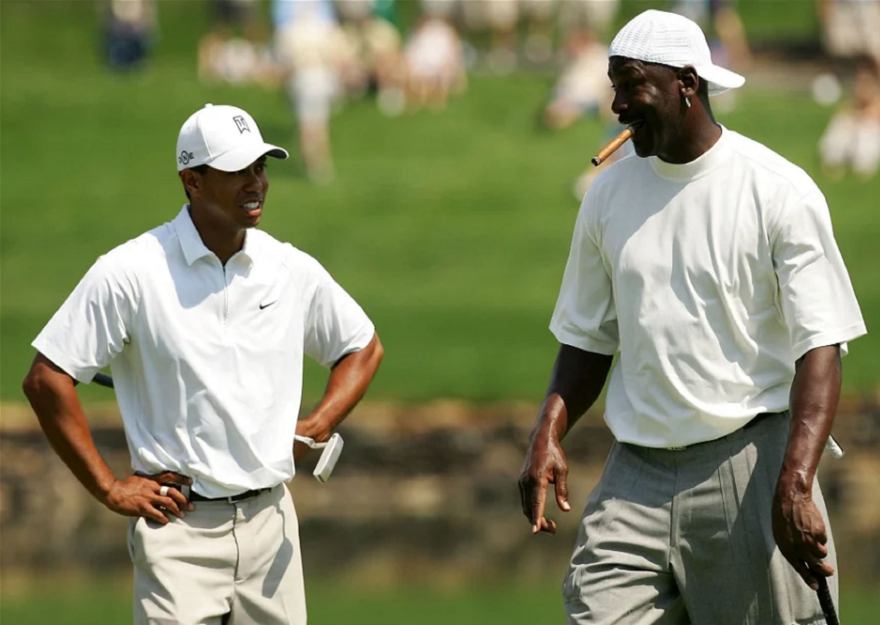 Tiger Woods and Michael Jordan playing golf (Image via Getty Images)
