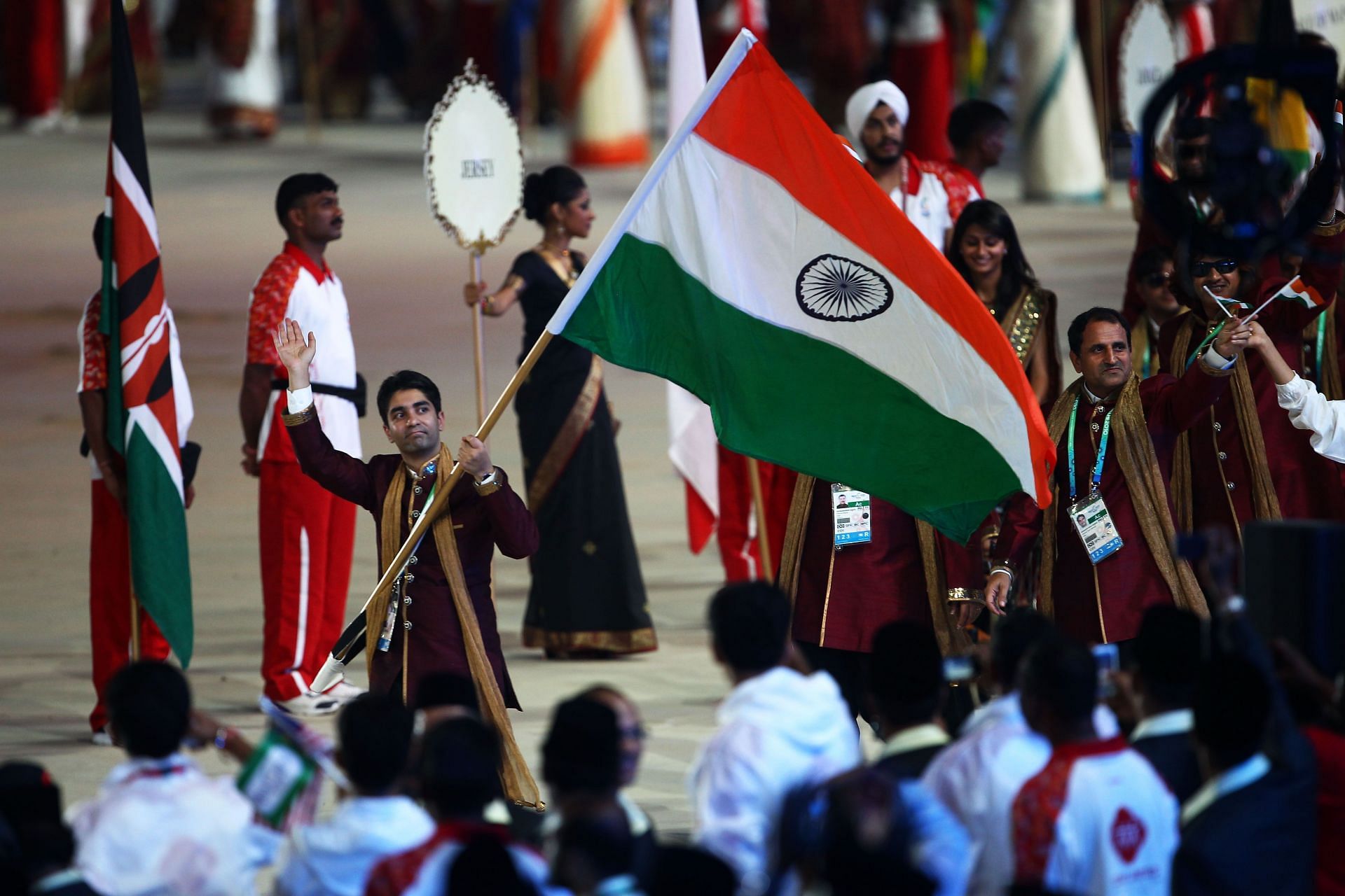 Abhinav Bindra of India carries his nation&#039;s flag during the Opening Ceremony for the Delhi 2010 Commonwealth Games. (Photo by Getty Images)