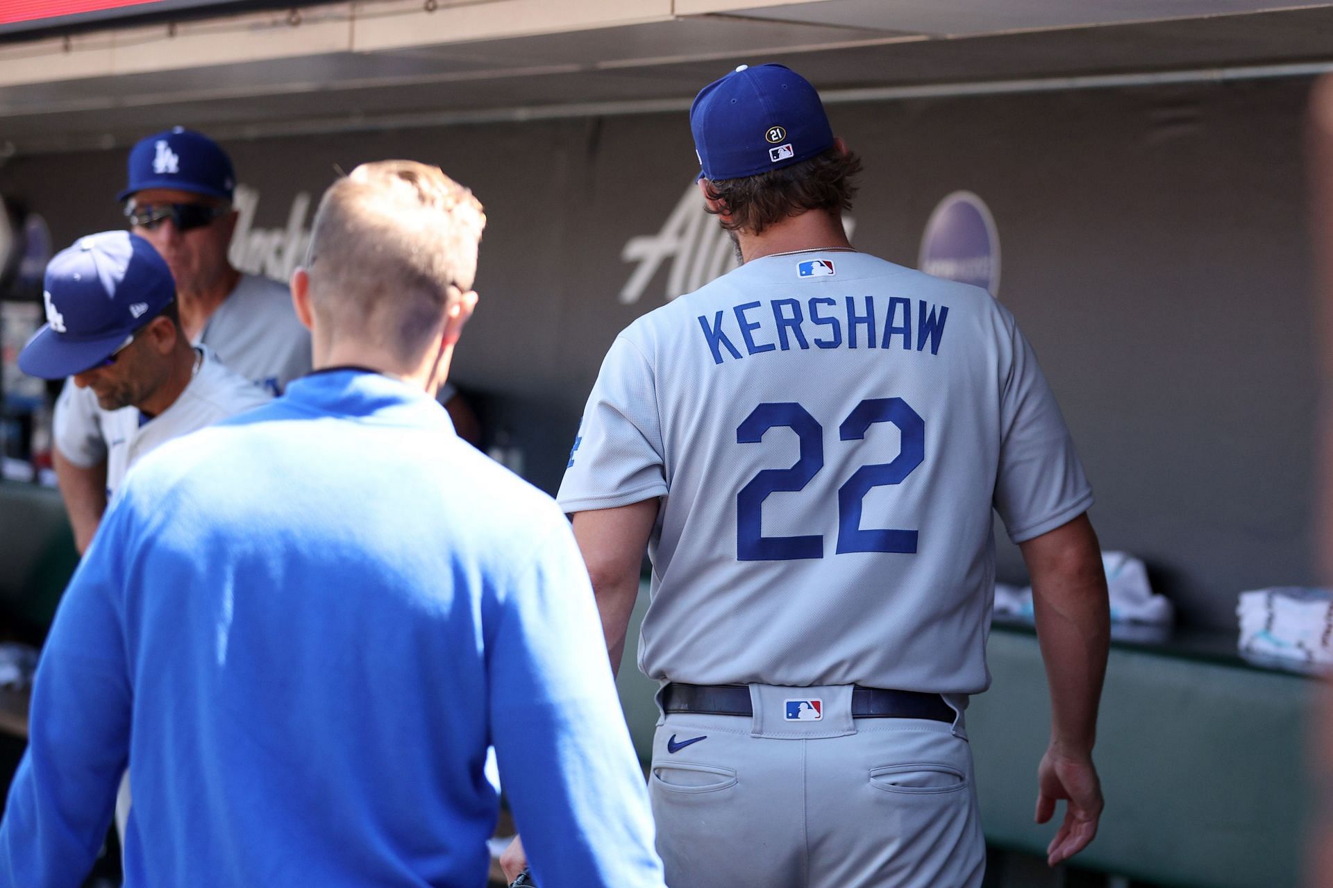 Clayton Kershaw #22 of the Los Angeles Dodgers walks through the dugout after he was pulled from the game in the fifth inning due to an injury against the San Francisco Giants at Oracle Park on August 04, 2022