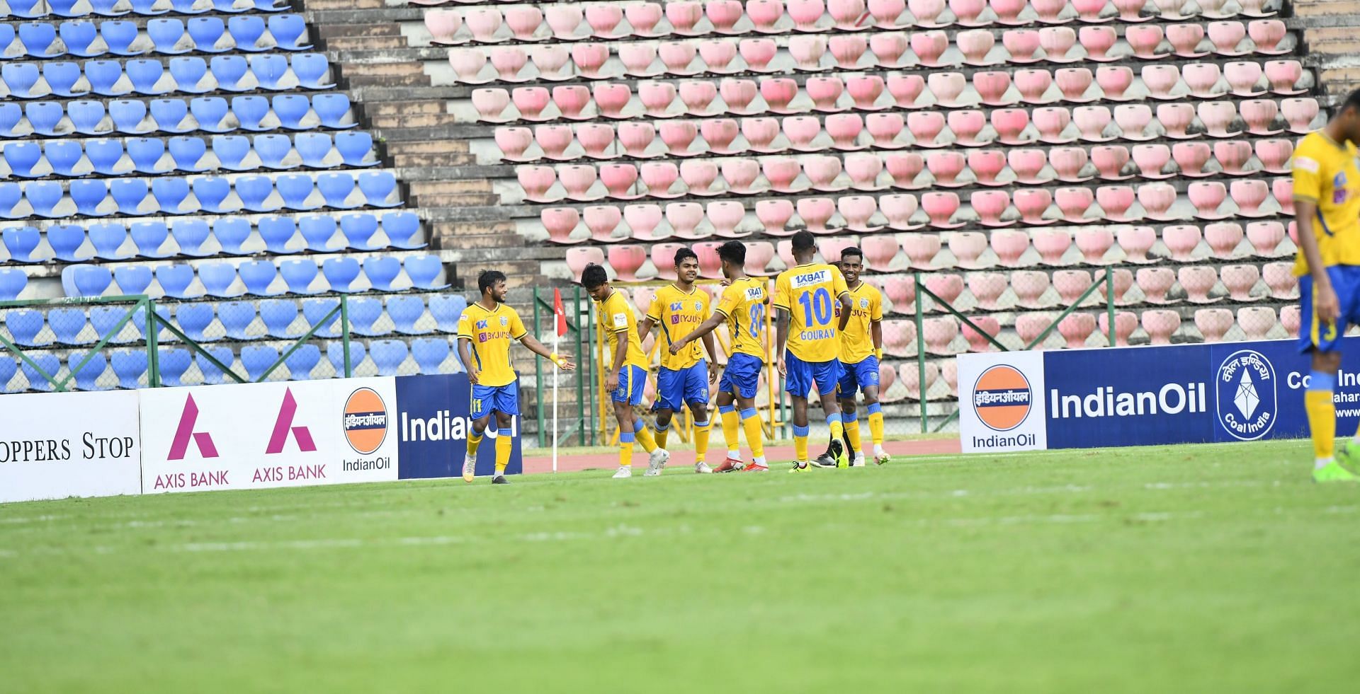 Kerala Blasters FC players celebrating their goal.