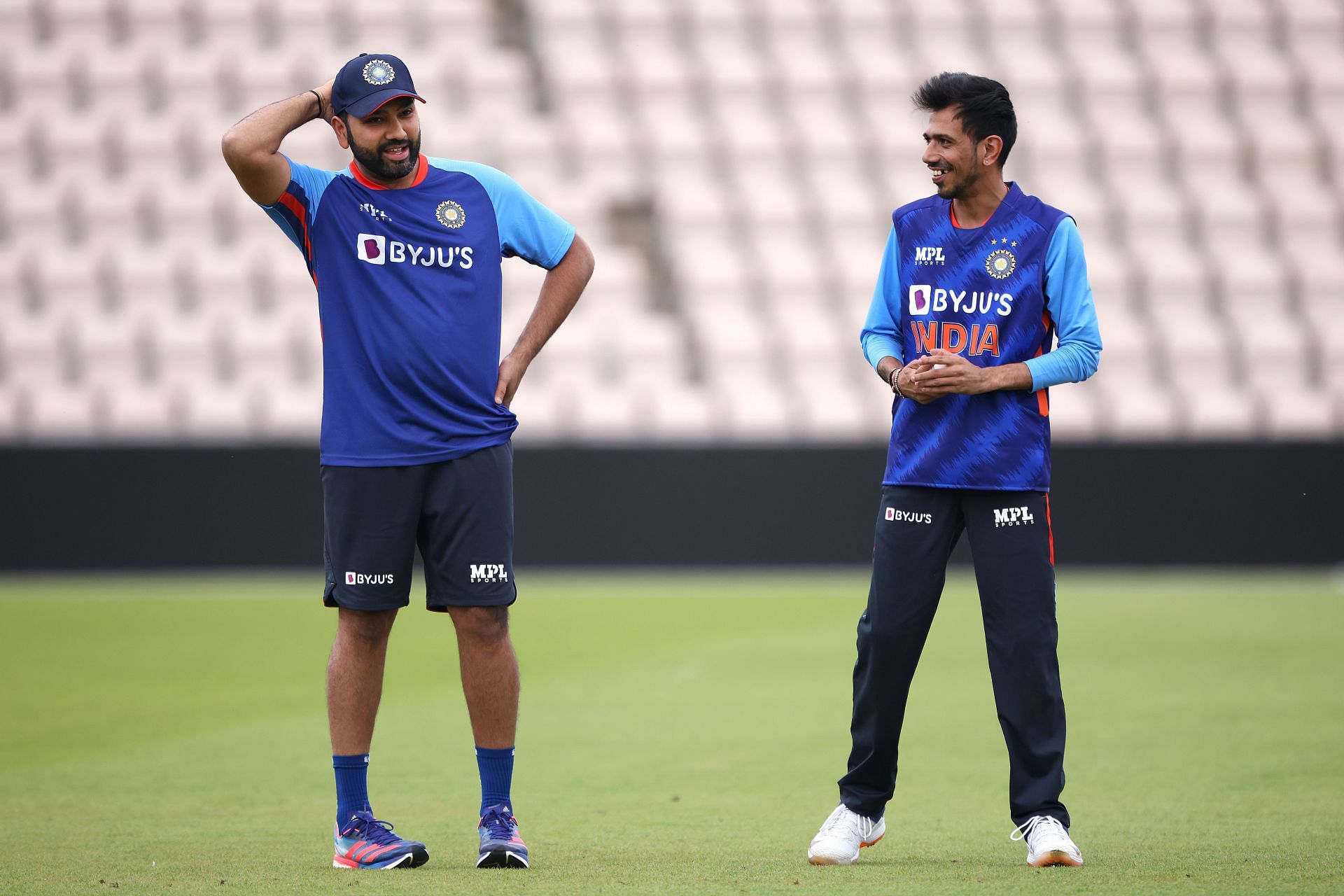 Yuzvendra Chahal (R) chats with the Indian captain. Pic: Getty Images