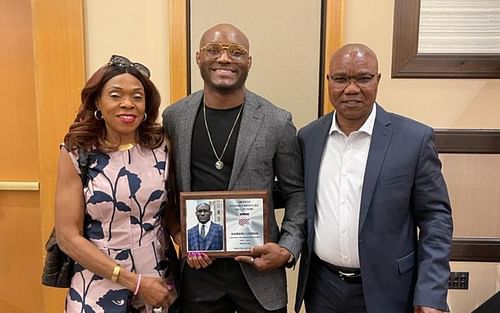 Kamaru Usman and family following NWCA Hall-of-Fame induction (Image credit: UFC.com)