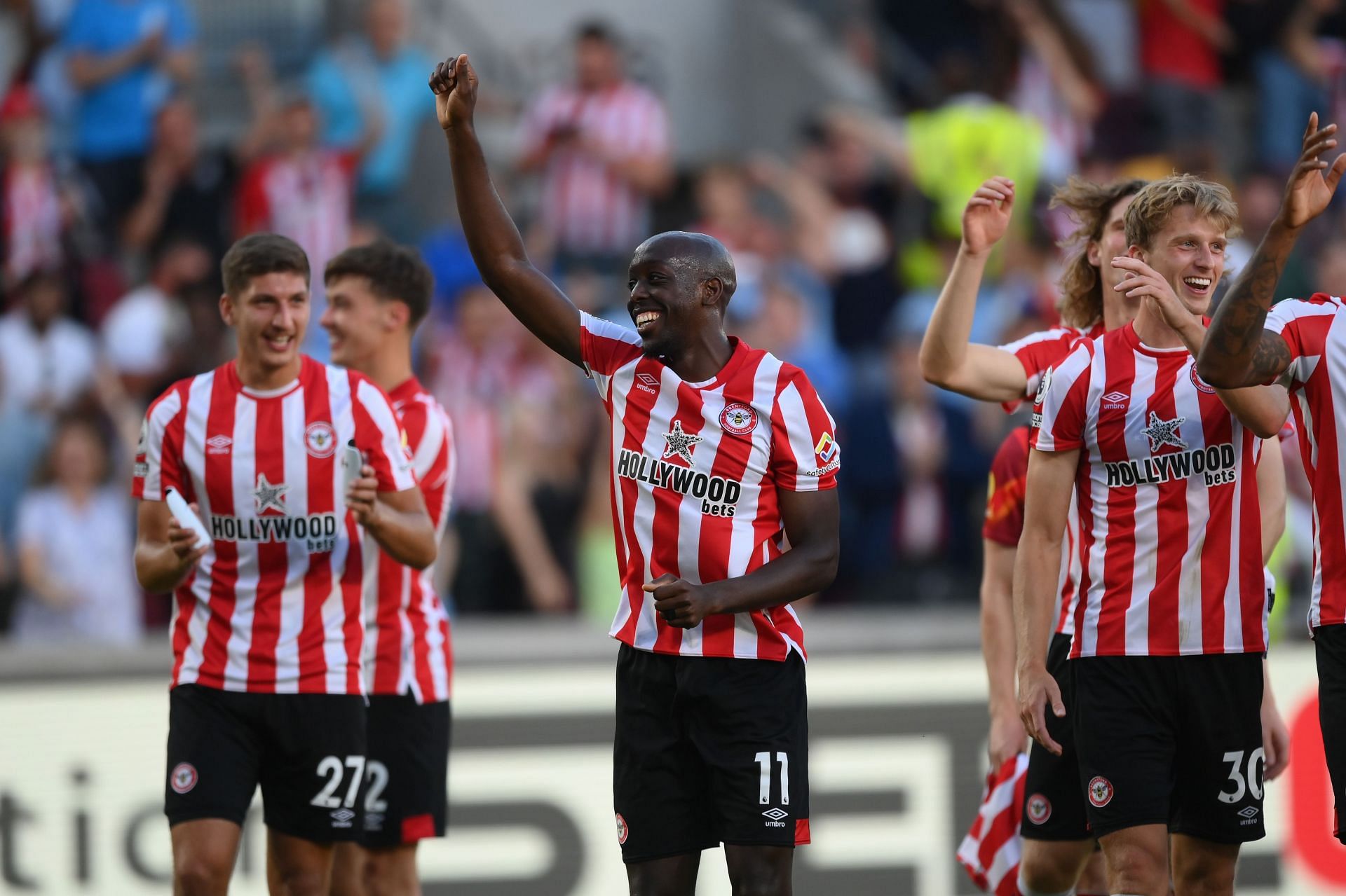 Brentford celebrate following their victory over Manchester United