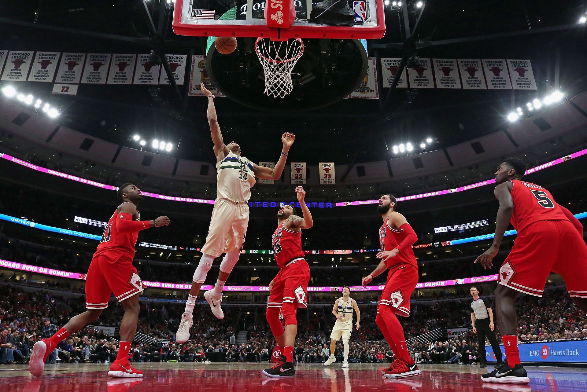 Giannis Antetokounmpo secures a rebound against the Chicago Bulls