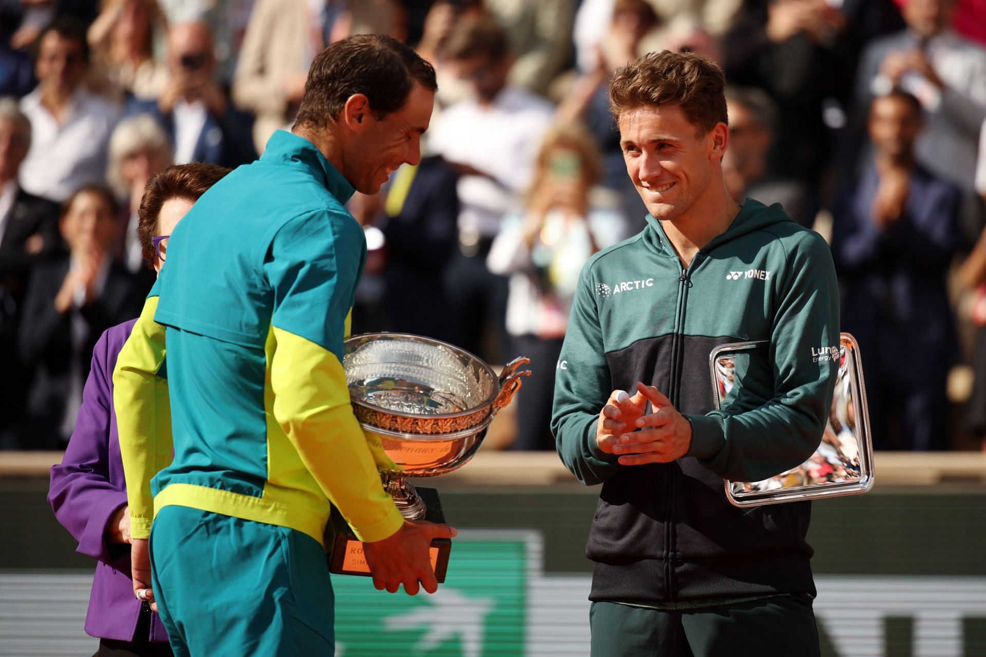 Casper Ruud applauds 2022 French Open champion Rafael Nadal.