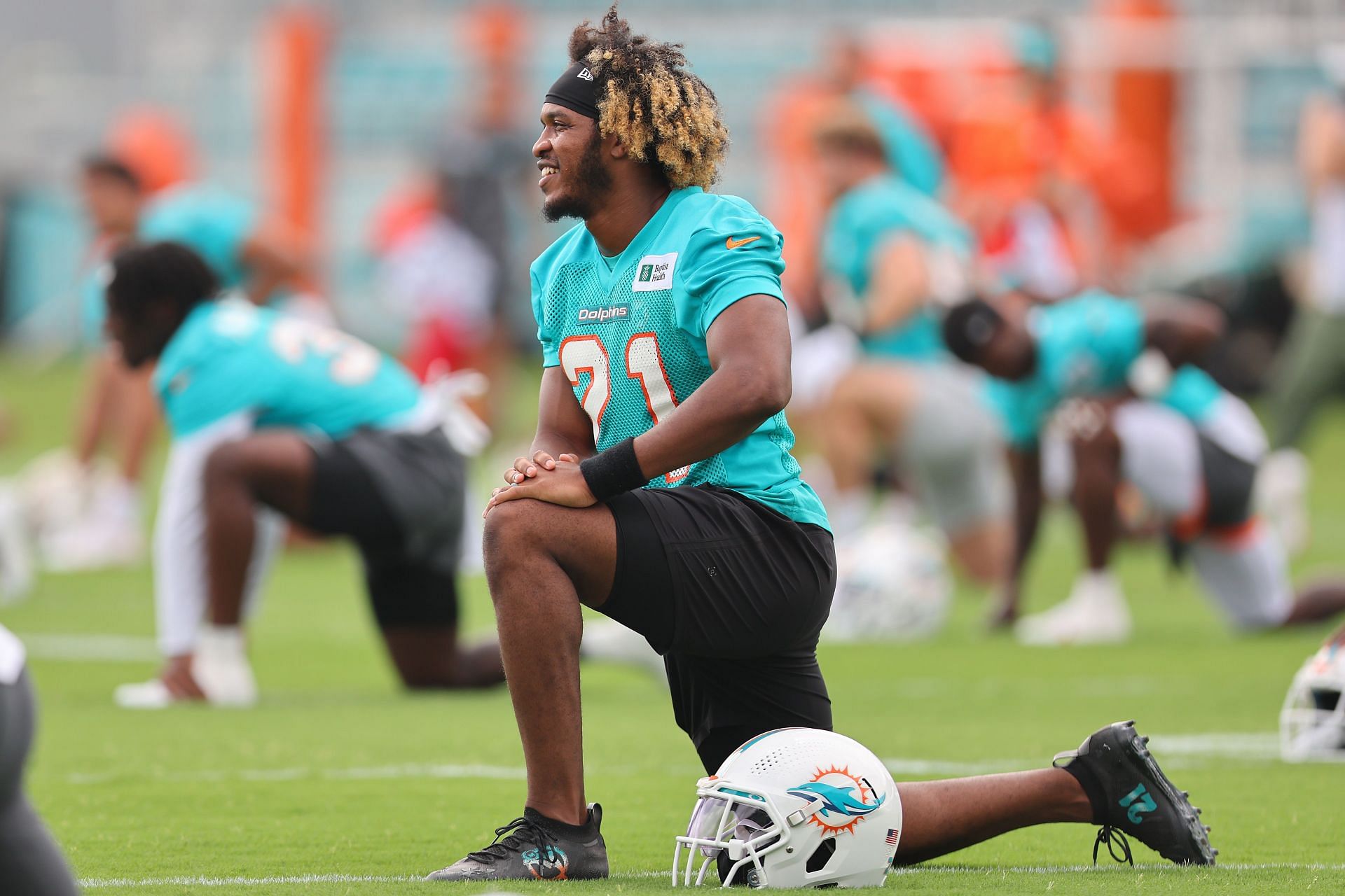 Miami Dolphins stretch in training camp
