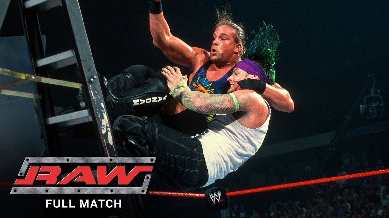 Jeff Hardy delivering a Belly-to-Back Suplex off the ladder to RVD.