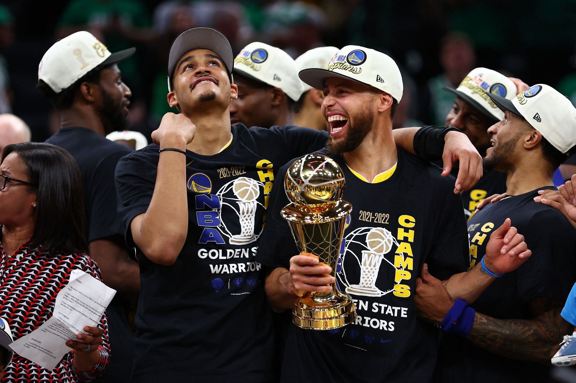 Steph Curry and Jordan Poole of the Golden State Warriors after winning the 2022 NBA Finals