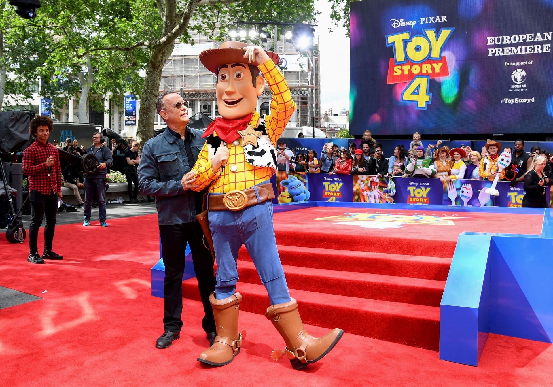 Representational image of Woody mascot with Tom Hanks (Image via Gareth Cattermole/Getty Images)