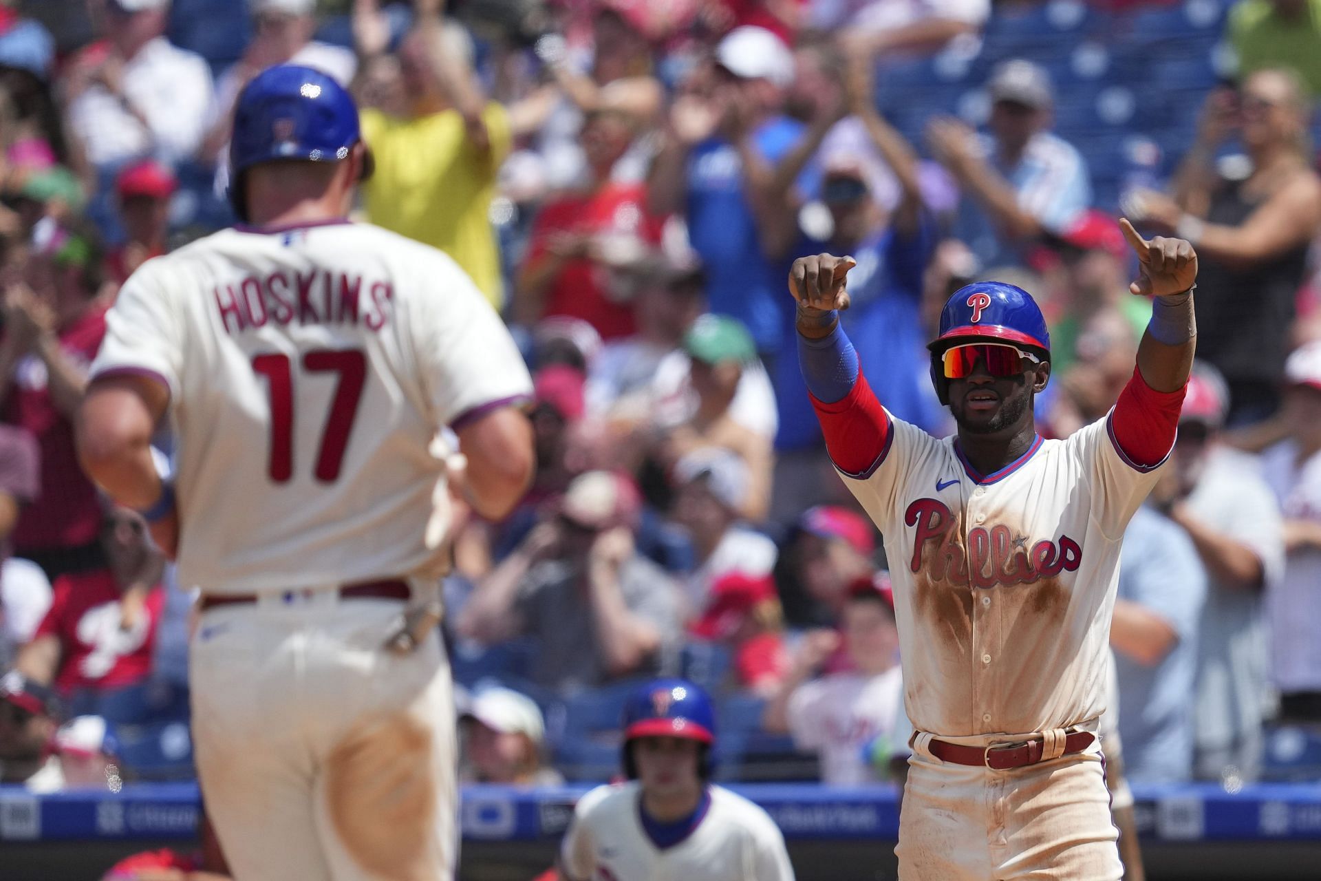 Rhys Hoskins and Odubel Herrera celebrate after a two-run home run during a Atlanta Braves v Philadelphia Phillies game.