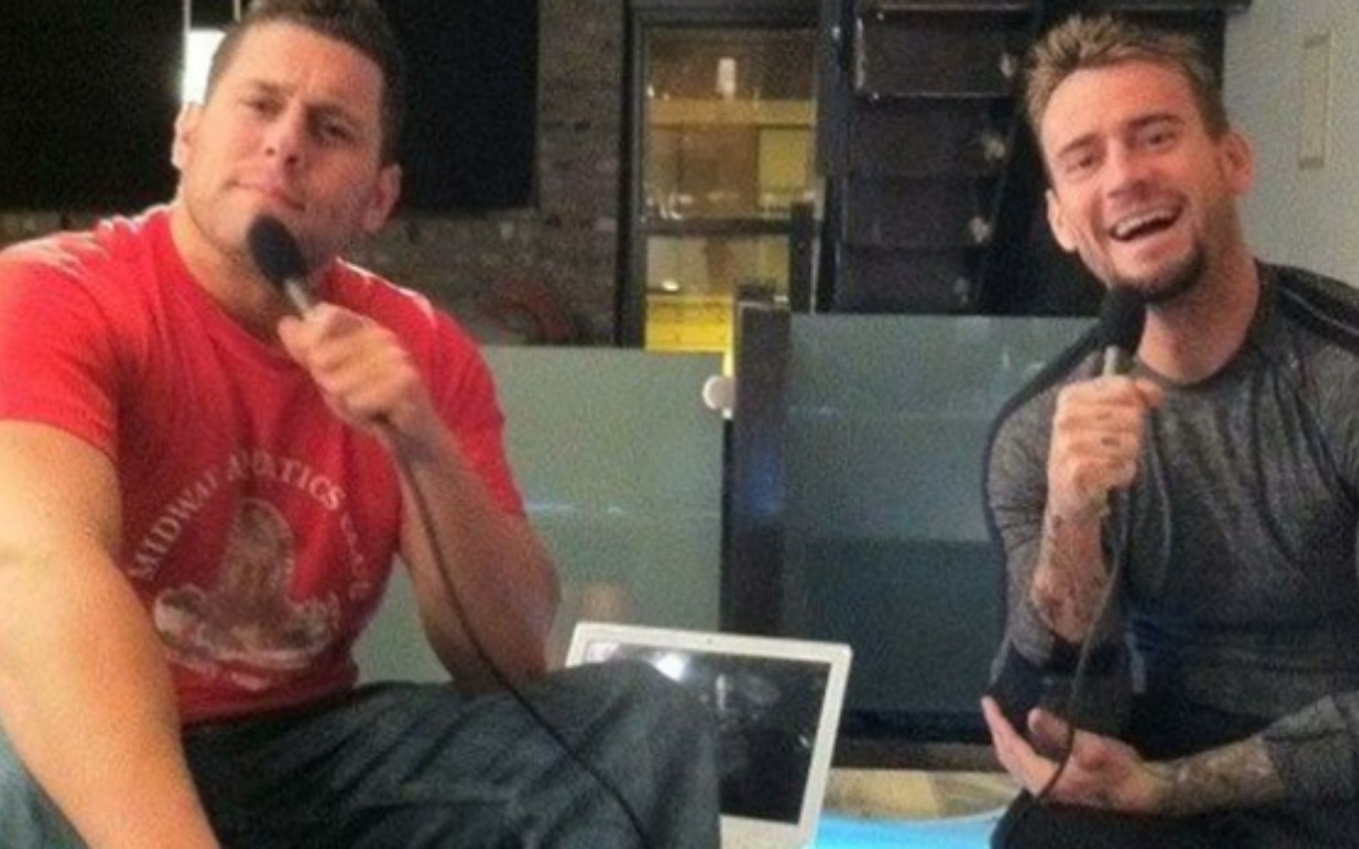 Colt Cabana (Left); CM Punk (Right)