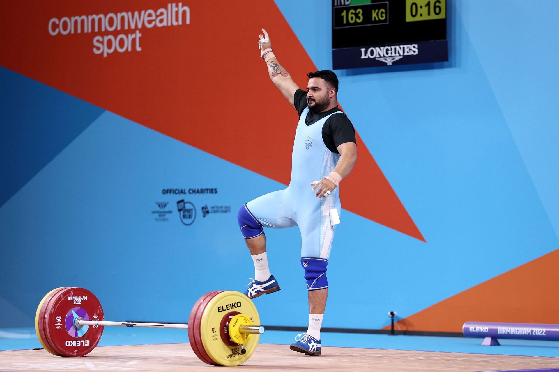Weightlifting - Commonwealth Games: Day 6 Lovepreet Singh&#039;s celebration after a successful lift