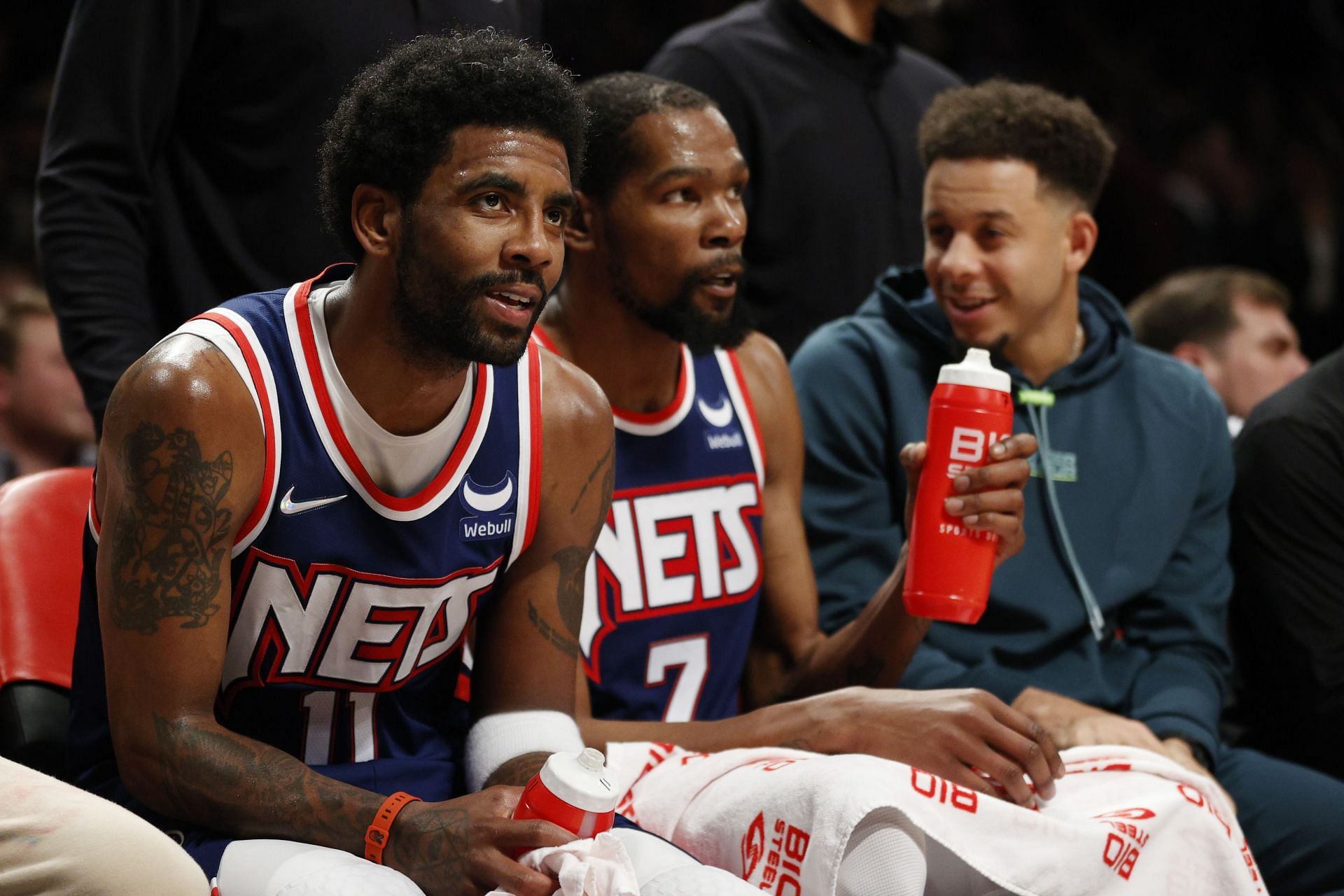 Kevin Durant and Kyrie Irving on the Brooklyn Nets bench