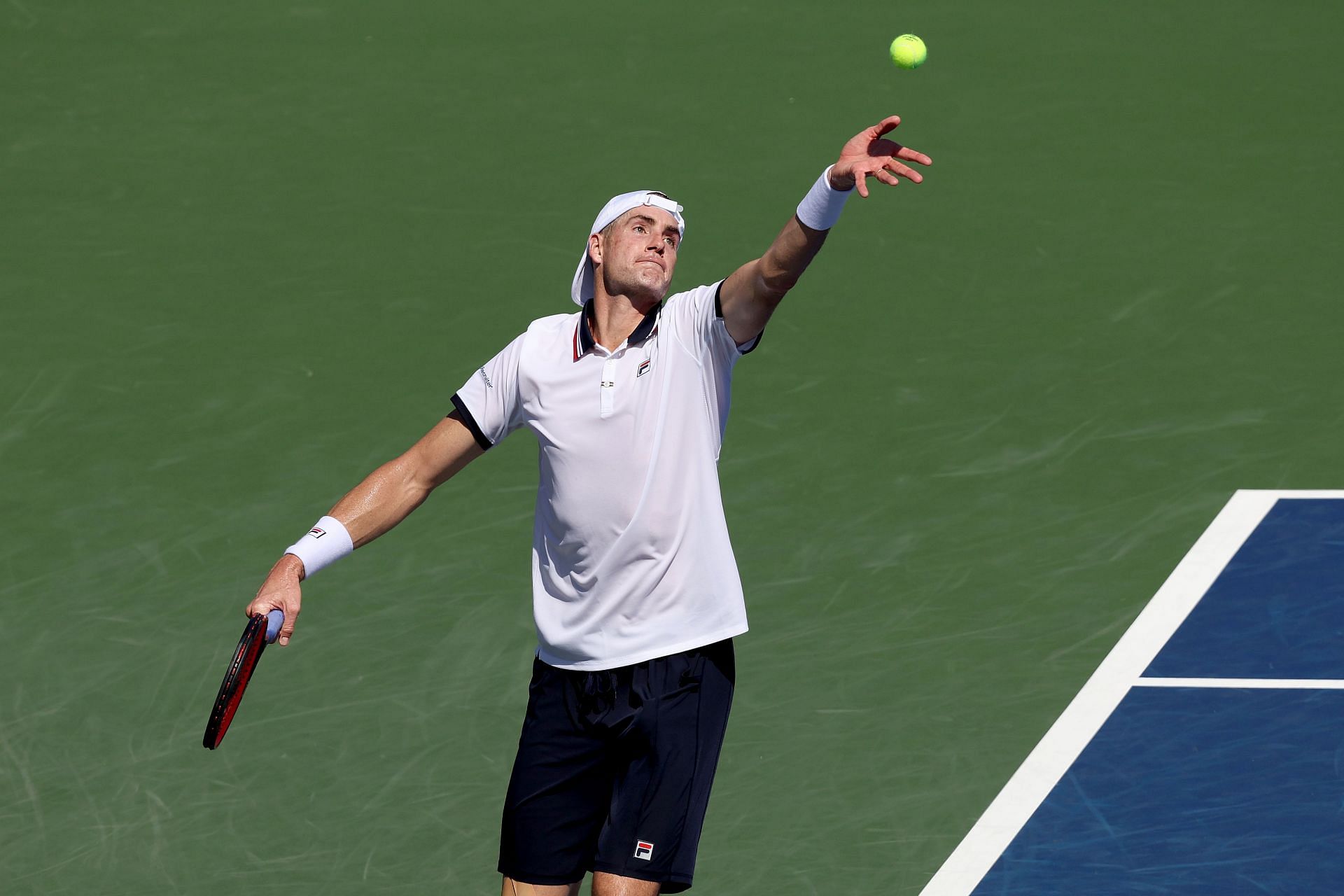 Isner serves at the 2022 US Open - Day 2