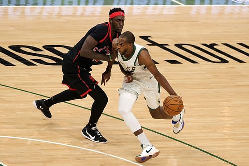 Khris Middleton of the Milwaukee Bucks against Pascal Siakam of the Toronto Raptors