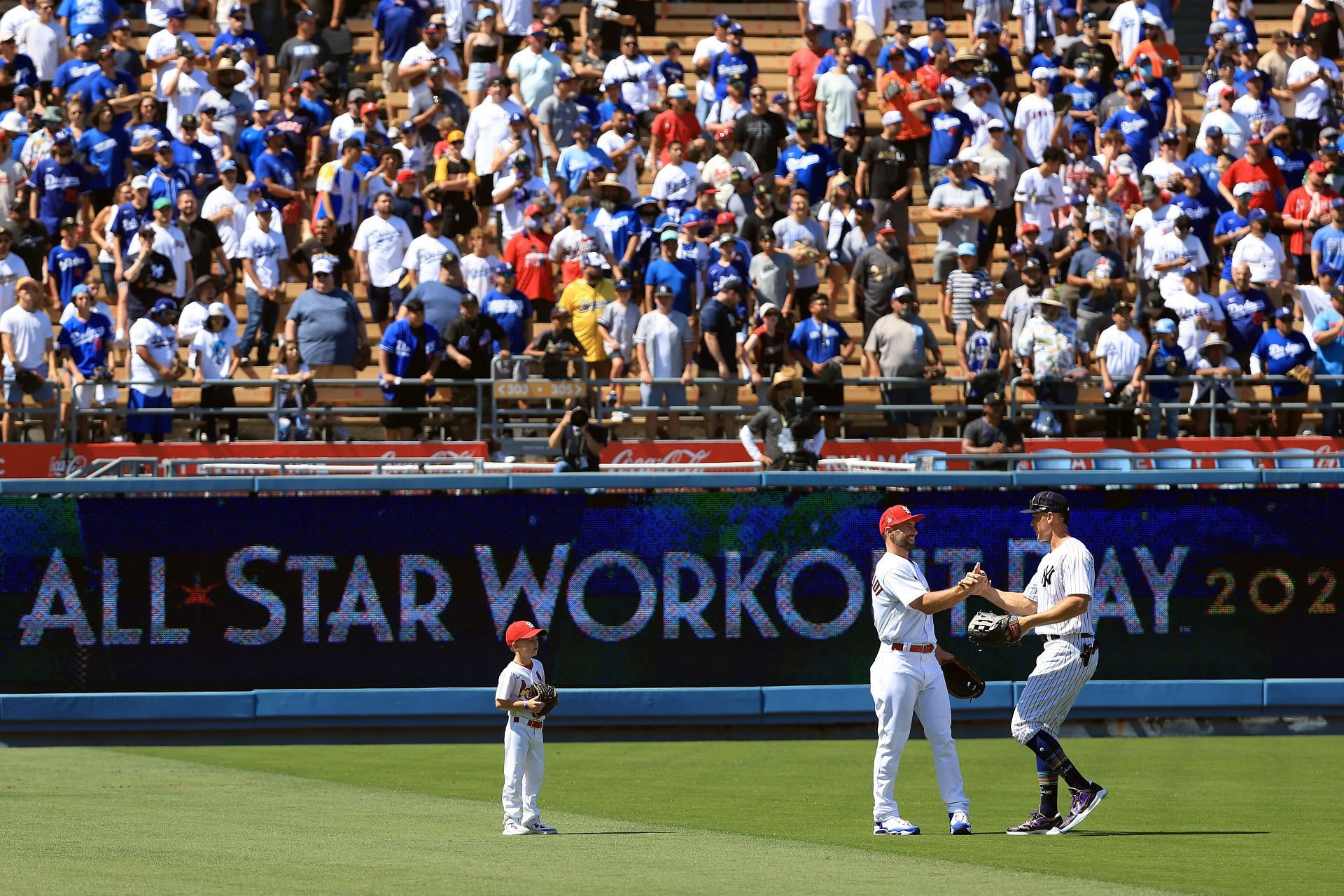 Paul Goldschmidt #46 of the St. Louis Cardinals (L) and Aaron Judge #99 of the New York Yankees shake hands during the 2022 Gatorade All-Star Workout Day at Dodger Stadium on July 18, 2022