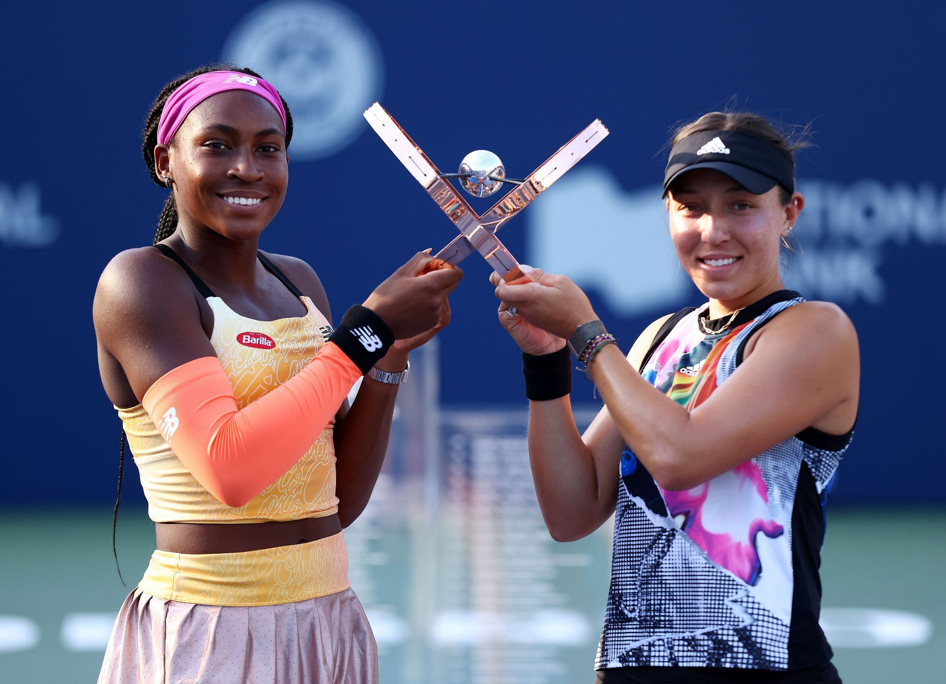 Coco Gauff (left) and Jessica Pegula celebrate their Canadian Open win.