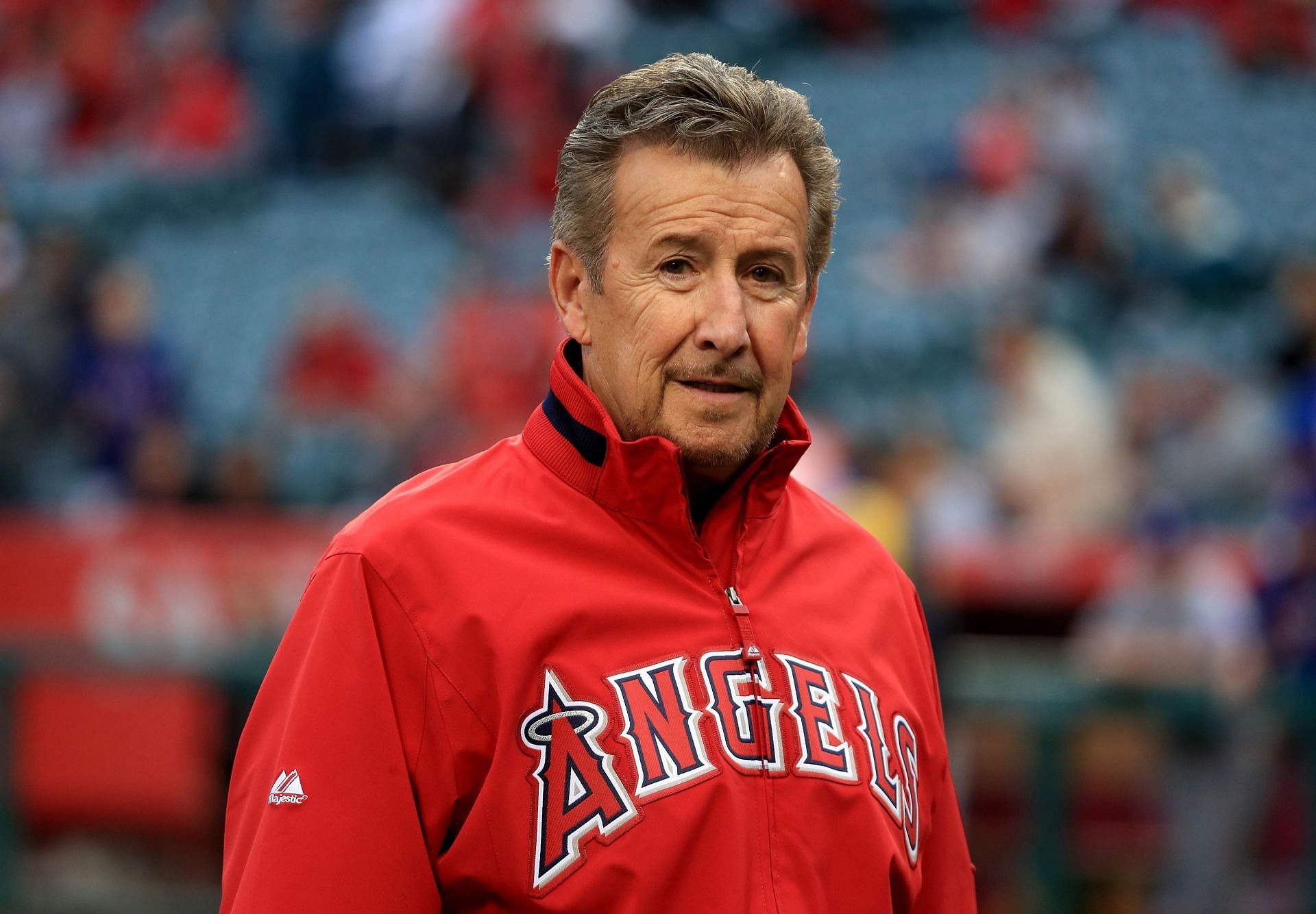 Los Angeles Angels owner Arte Moreno looks on during a Texas Rangers v Los Angeles Angels game.