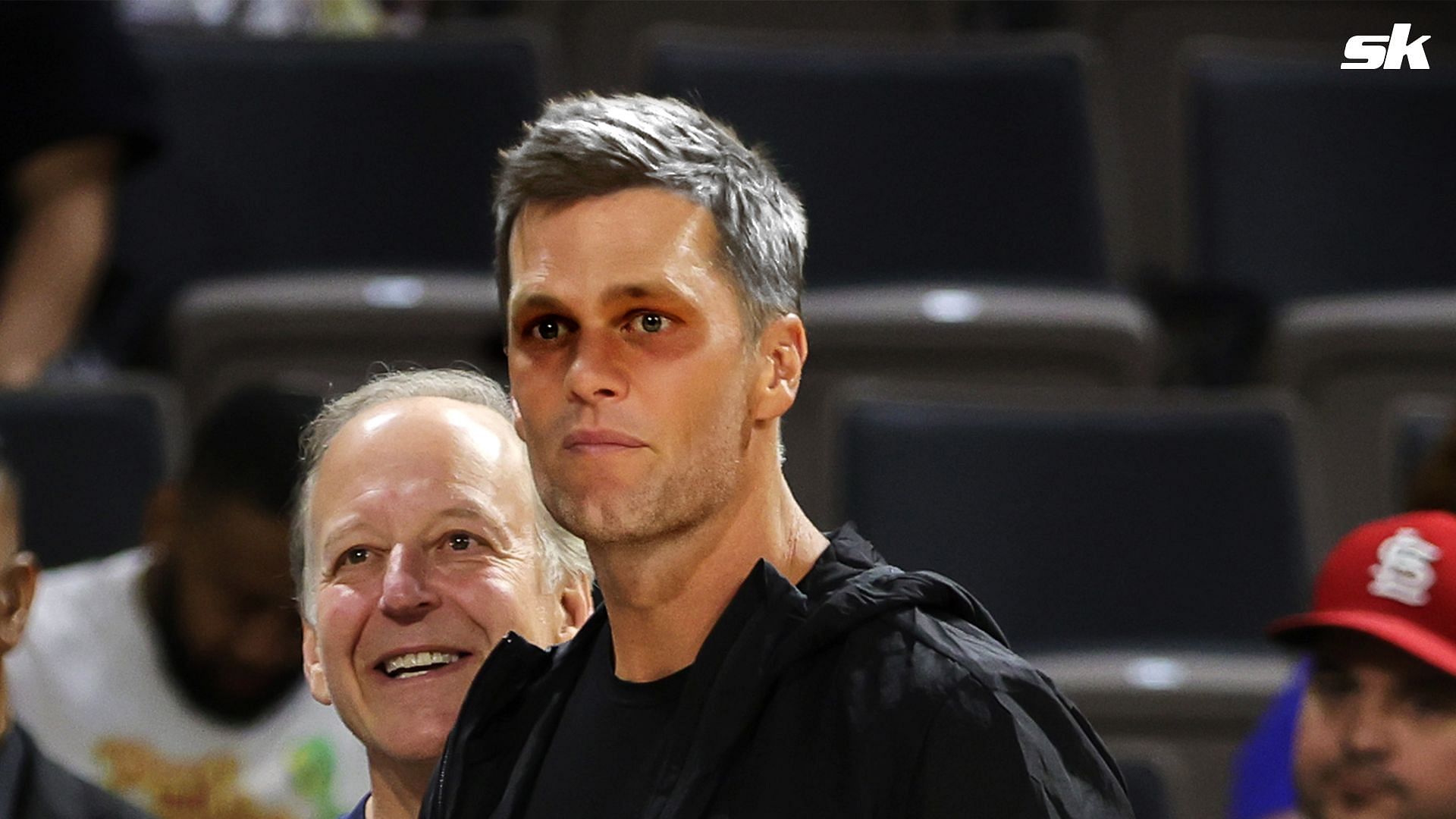 Tom Brady looks miserable, like a guy who has stayed around a year