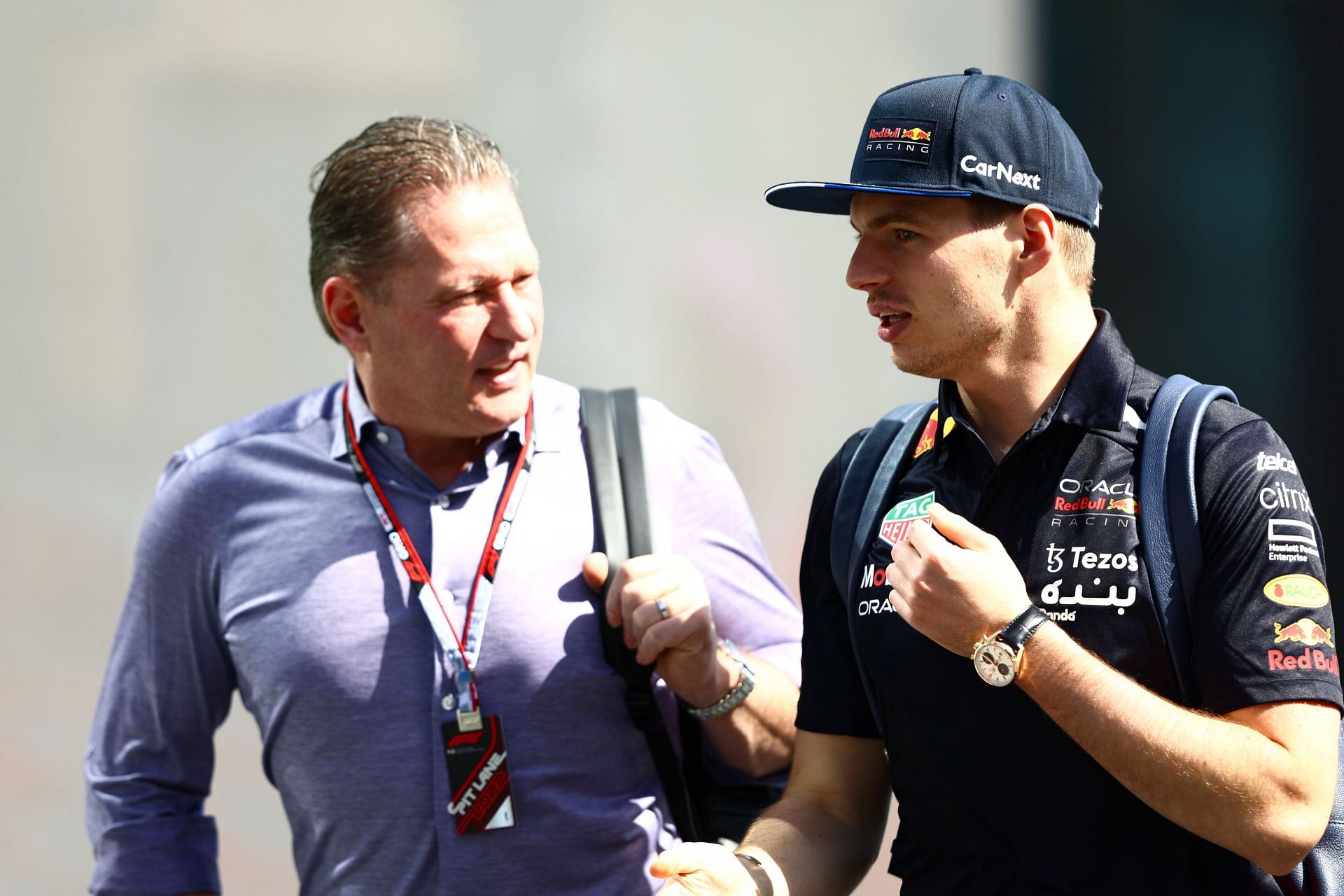 Max Verstappen (right) and his father Jos talk in the Paddock before final practice ahead of the F1 Grand Prix of Saudi Arabia at the Jeddah Corniche Circuit on March 26, 2022, in Jeddah, Saudi Arabia (Photo by Mark Thompson/Getty Images