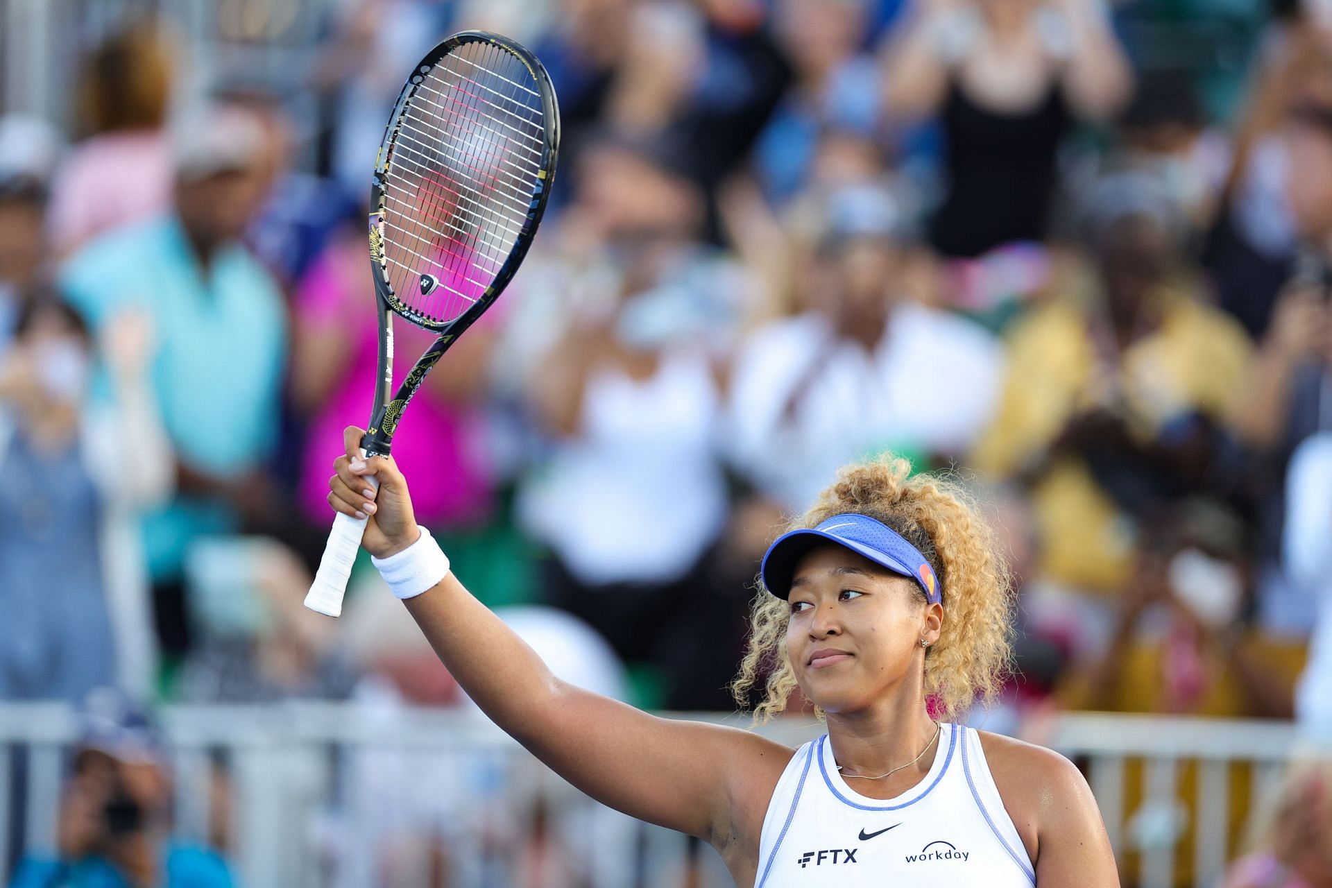 Naomi Osaka acknowledges the crowd after her victory.