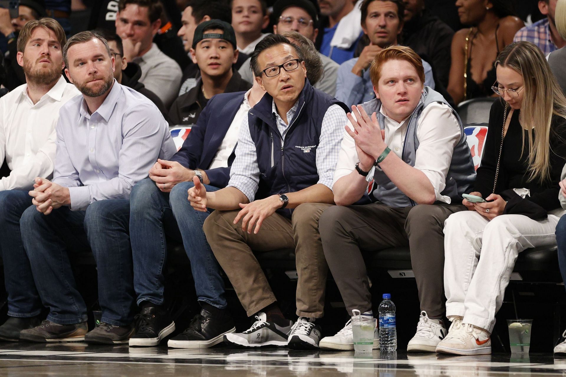 Brooklyn Nets owner Joe Tsai watching the 2022 NBA Play-In Tournament