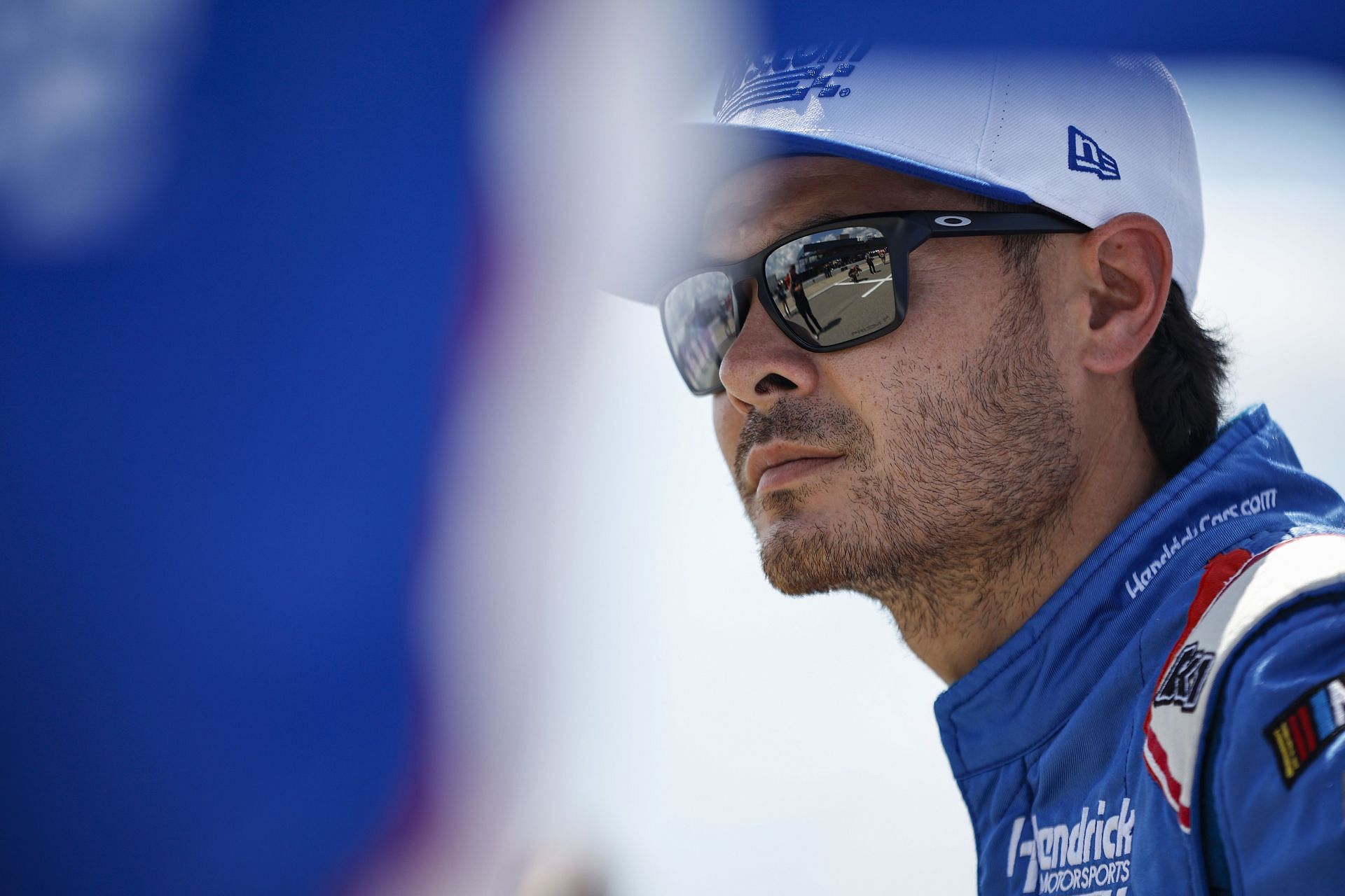 Kyle Larson looks on during practice for the NASCAR Cup Series FireKeepers Casino 400 at Michigan International Speedway