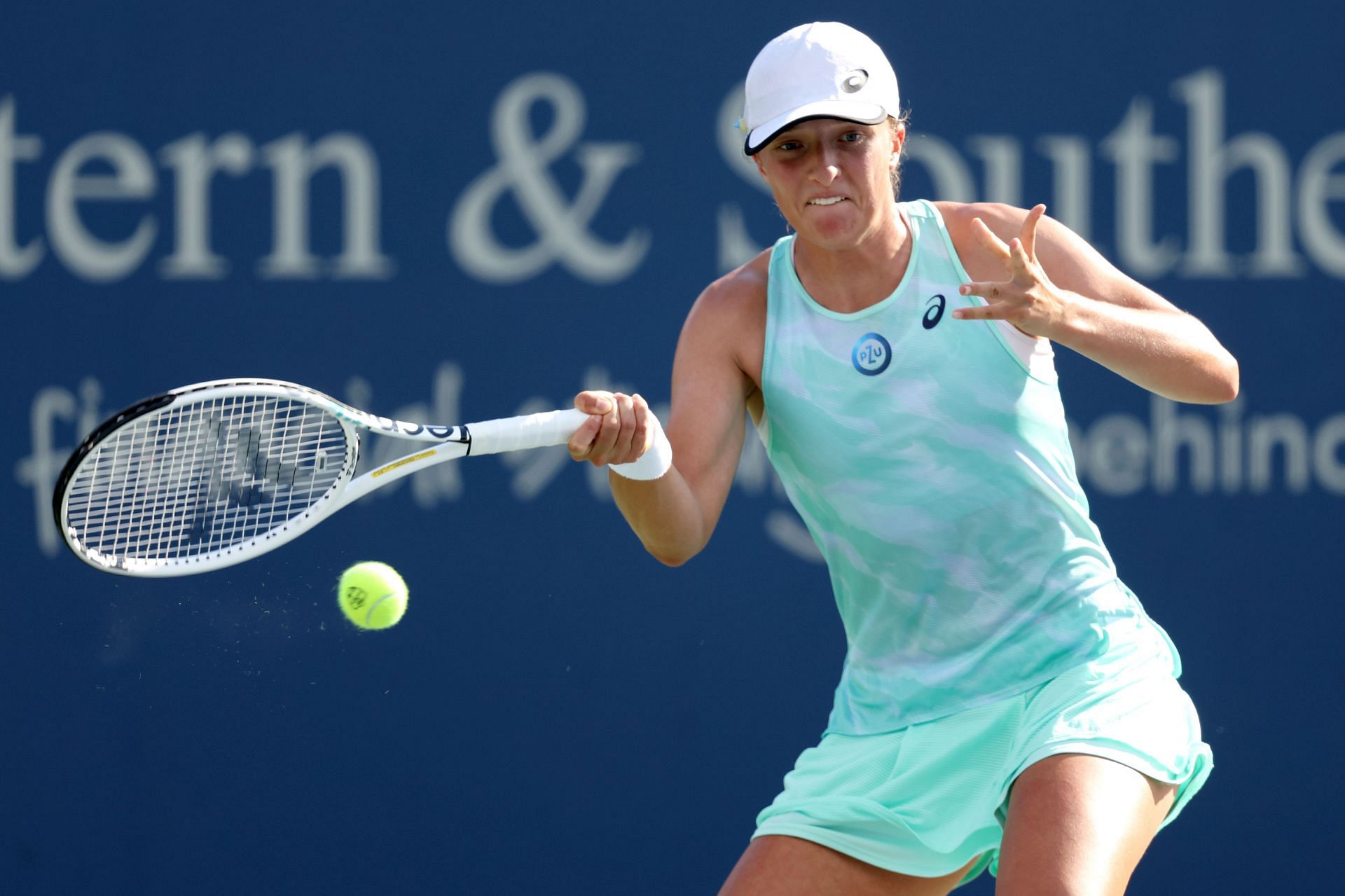 Iga Swiatek returns a shot to Sloane Stephens during the Western & Southern Open - Day 5