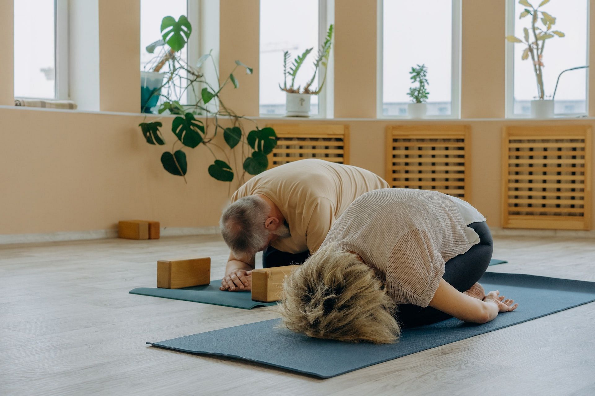 Yoga exercises offer great advantages to seniors. (Photo via Pexels/Mikhail Nilov)