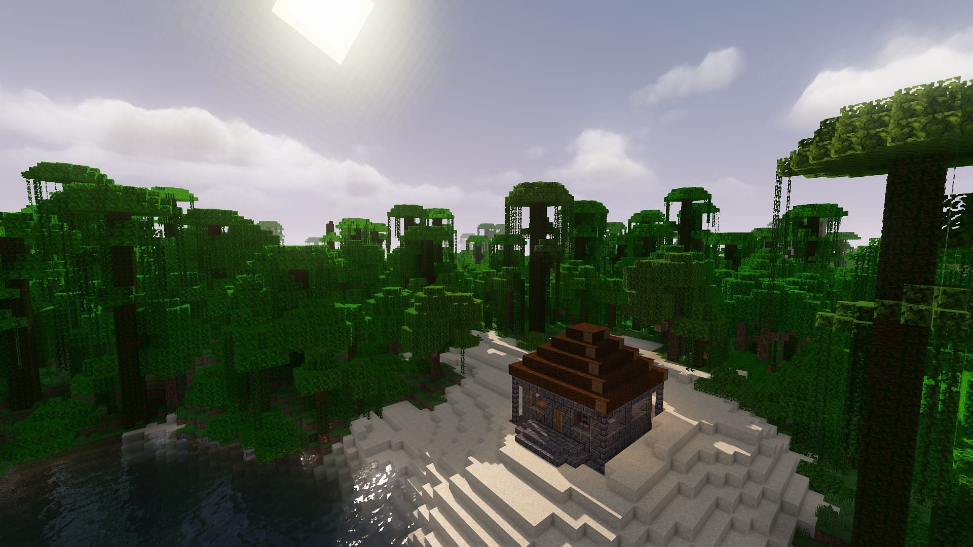 A beachside base near a jungle biome, as seen using Iris and MakeUp Ultra Fast Shaders (Image via Minecraft)