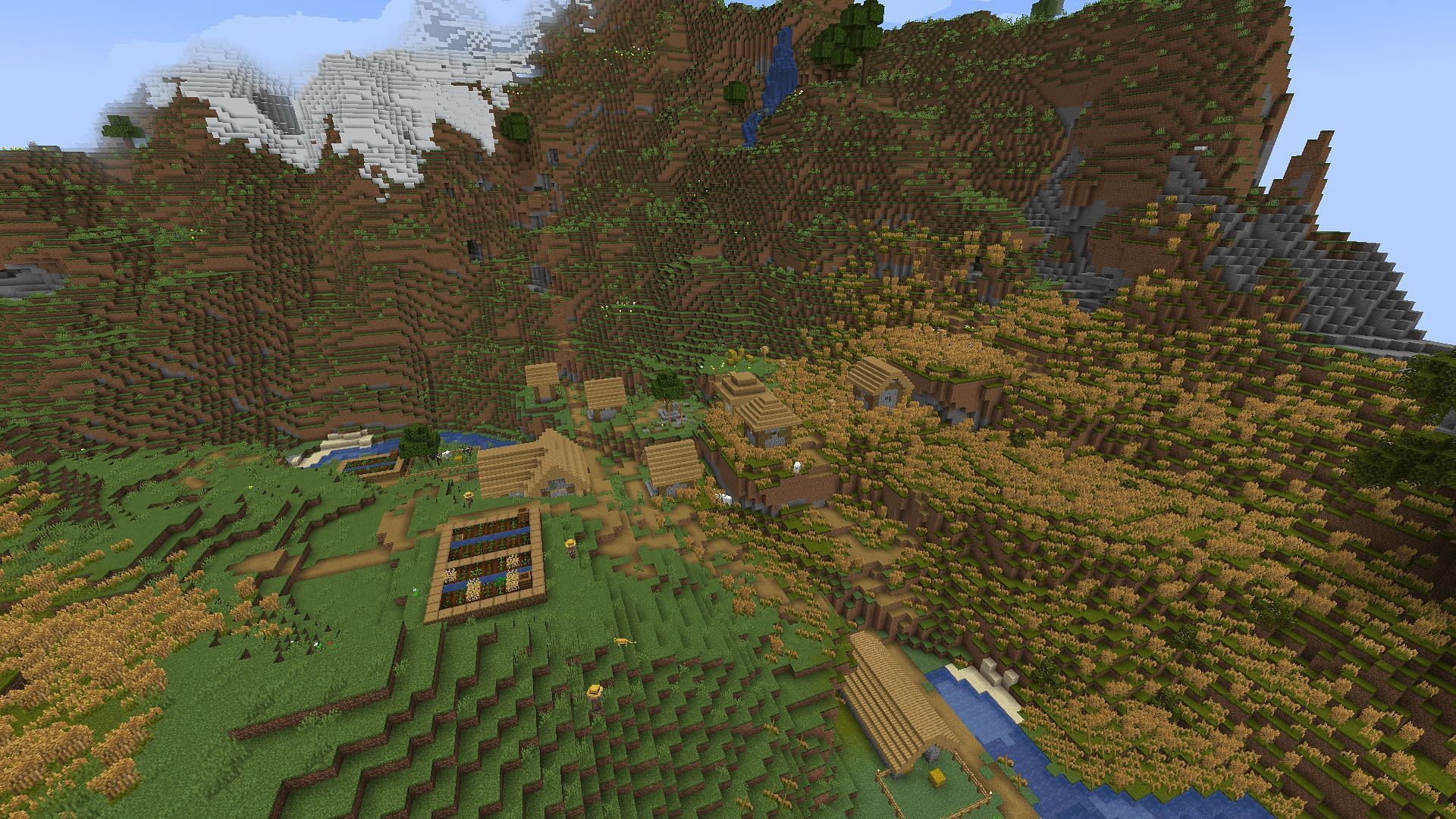 A prairie village at the foot of a mountain, one of many additions from the mod (Image via Minecraft)
