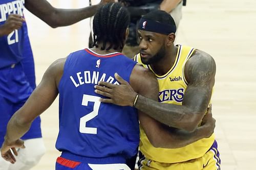 LA Clippers forward Kawhi Leonard, left, and LA Lakers forward LeBron James