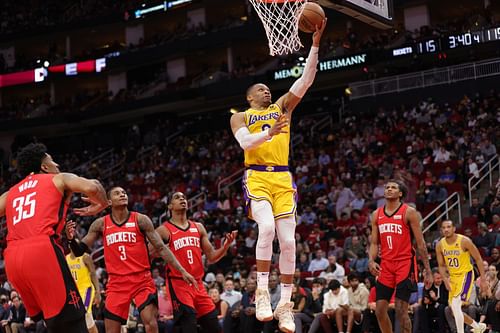 Russell Westbrook attempts to score off a layup