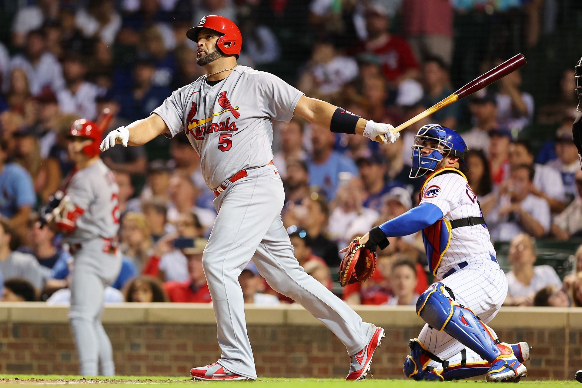 Albert Pujols hits a solo home run during the seventh inning off Drew Smyly at Wrigley Field.