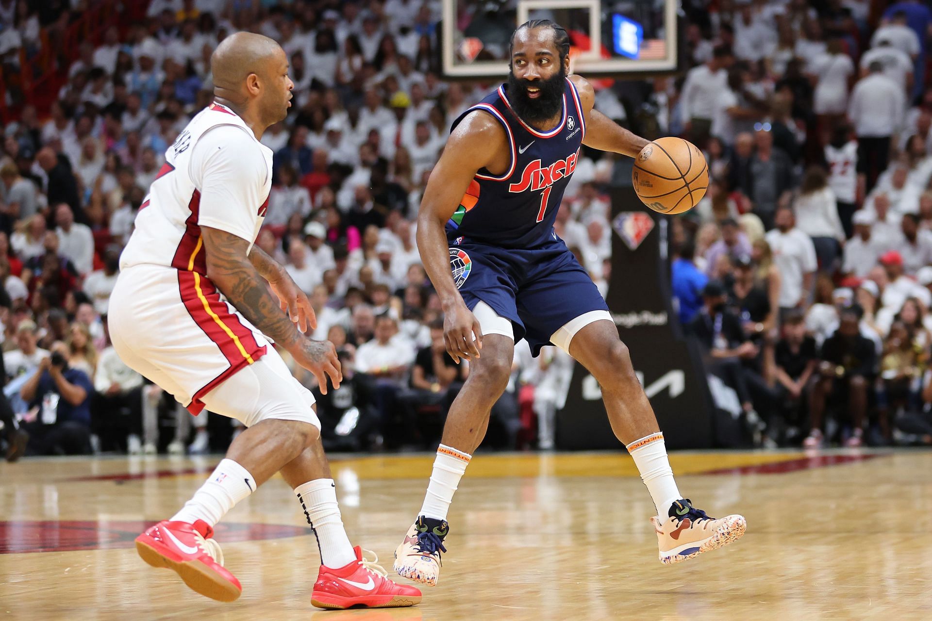James Harden being guarded by P.J. Tucker