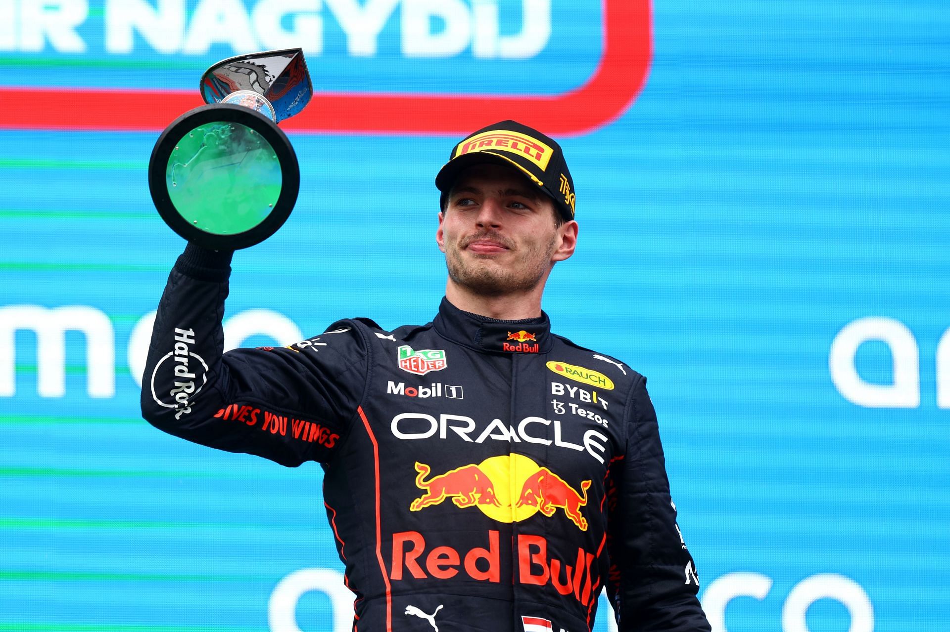 Race winner Max Verstappen celebrates on the podium during the F1 Grand Prix of Hungary at Hungaroring on July 31, 2022, in Budapest, Hungary. (Photo by Francois Nel/Getty Images)