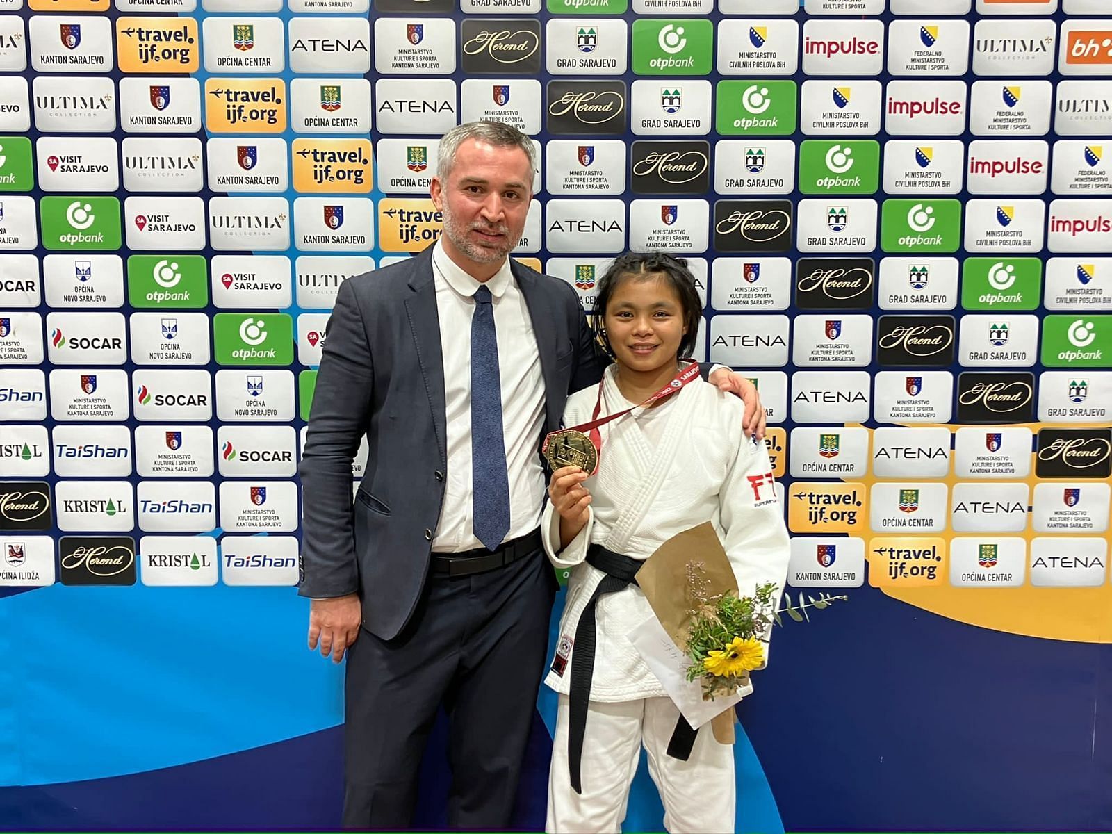 IIS head coach Mamuka Kizilashvili with Linthoi Chanambam. (PC: International Judo Federation)