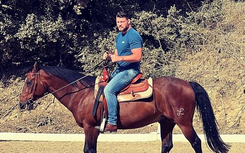 Michael Bisping uploaded a picture of himself on a horse [Image credits:@bisping on Twitter]