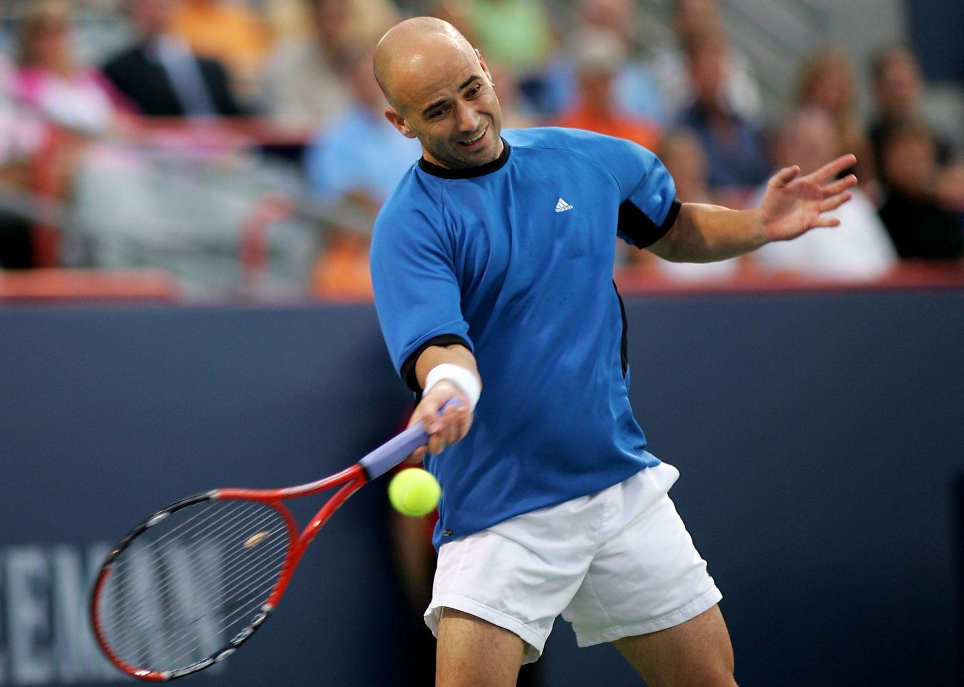 Andre Agassi hits a forhand