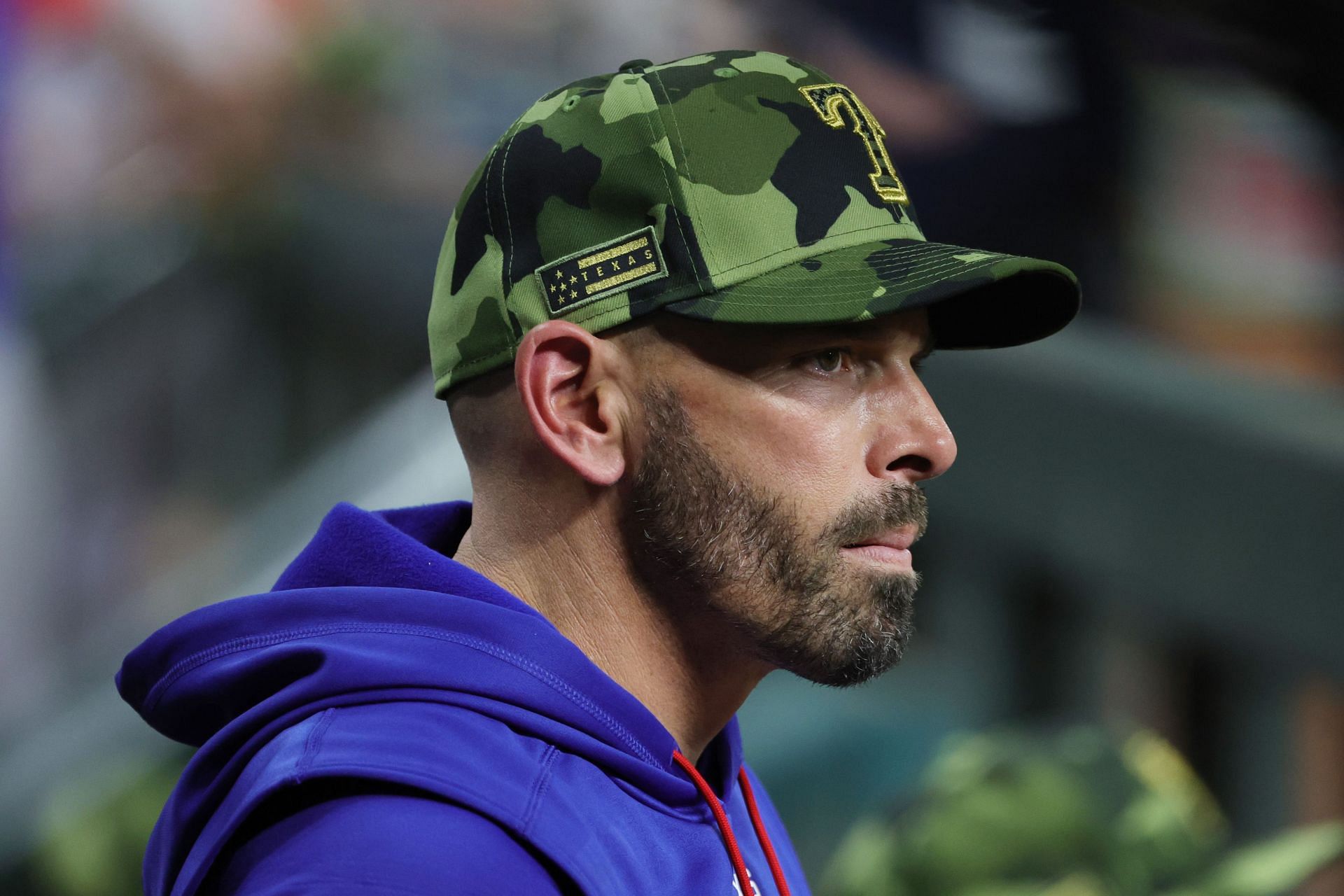 Texas Rangers manager Chris Woodward looks on during a game against the Houston Astros.