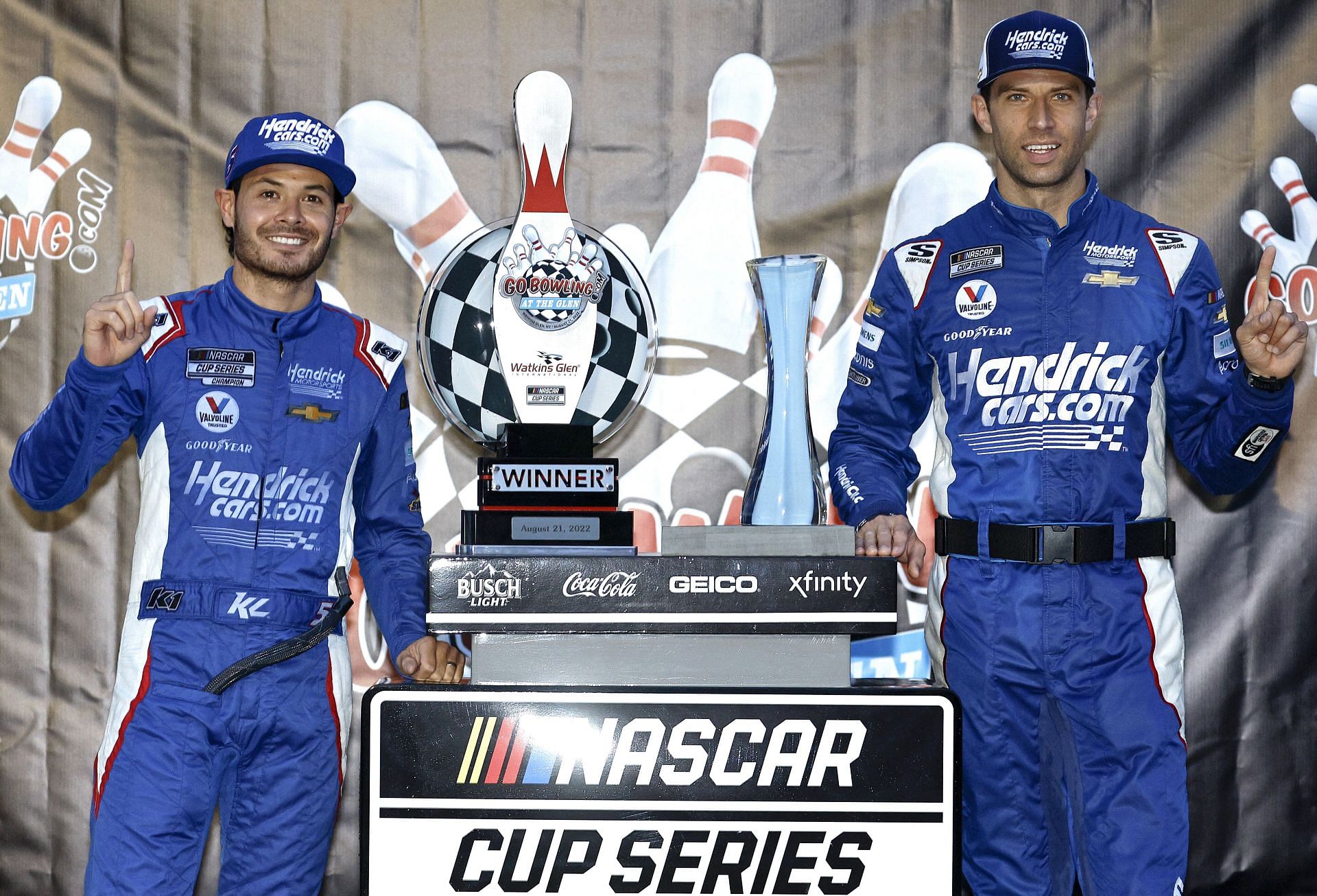 Kyle Larson and crew chief Cliff Daniels (right) celebrate in victory lane after winning the NASCAR Cup Series Go Bowling at The Glen at Watkins Glen International