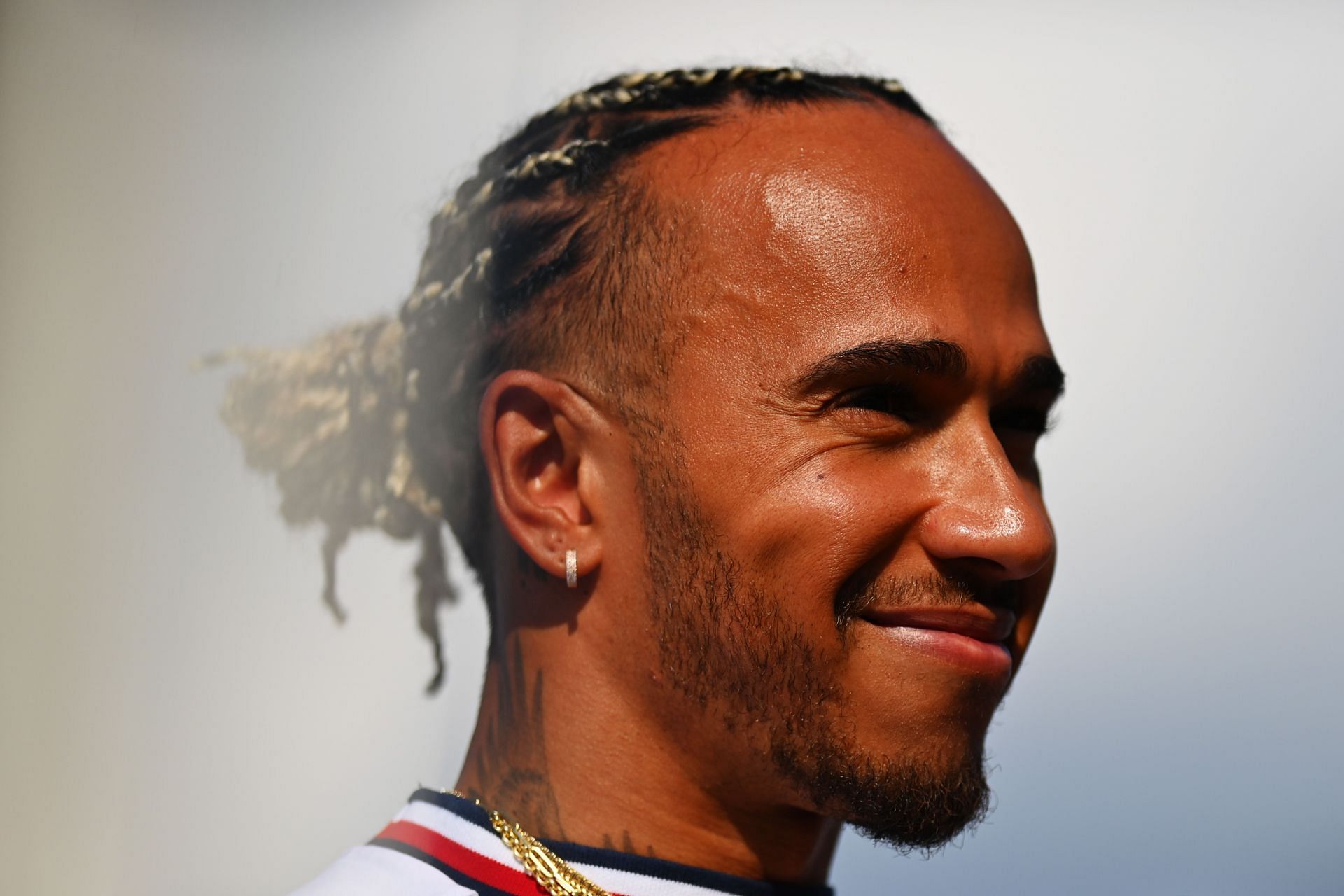 Lewis Hamilton of Great Britain and Mercedes looks on in the Paddock during previews ahead of the F1 Grand Prix of Hungary at Hungaroring on July 28, 2022, in Budapest, Hungary. (Photo by Dan Mullan/Getty Images)