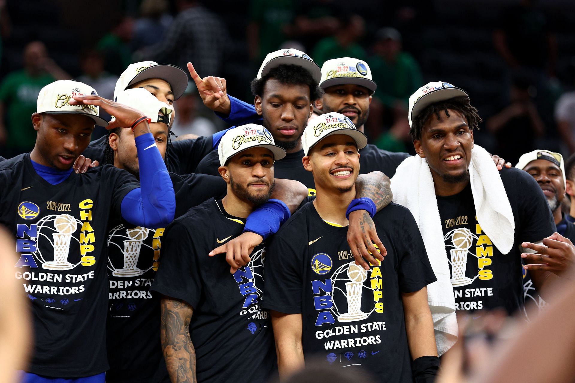 The Golden State Warriors pose for a photo after winning the 2022 NBA Finals
