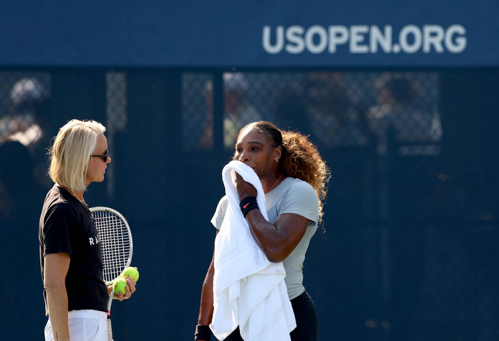 Rennae Stubbs talks to Serena Williams during a practice session in New York