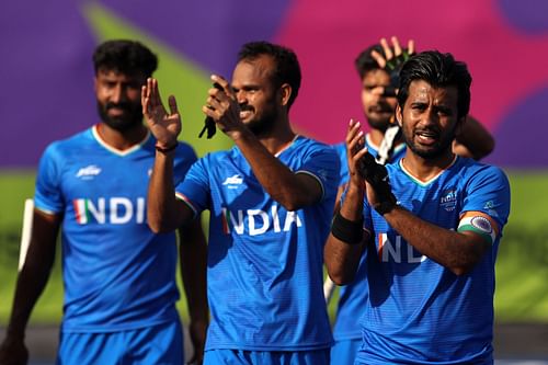 Indian men's hockey team captain Manpreet Singh (right) with teammates. (PC: Getty Images)