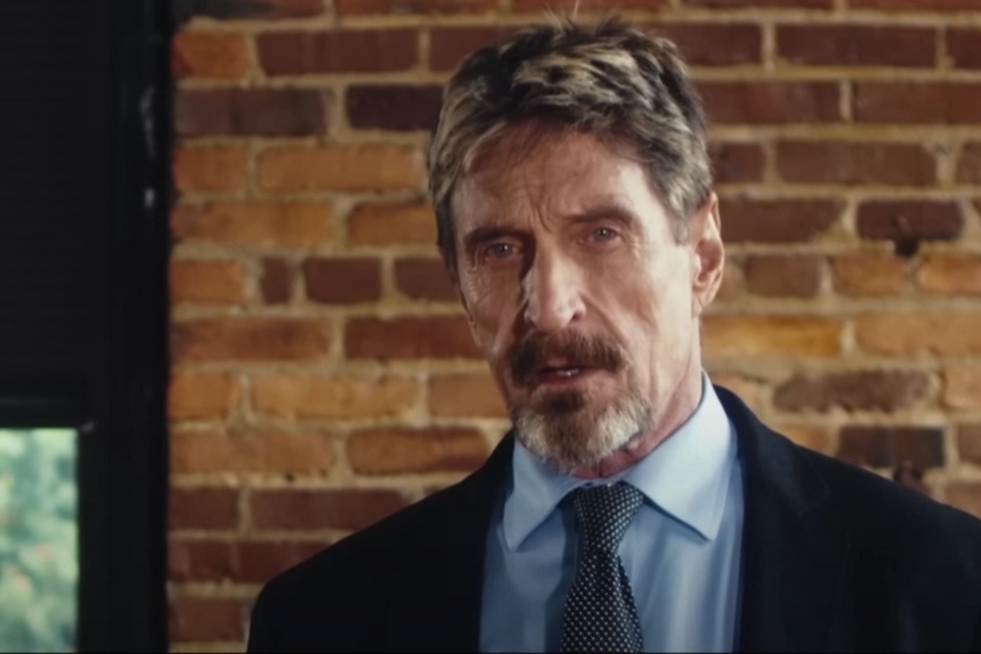 A still from Running with the Devil: The Wild World of John McAfee (Image via Netflix/YouTube)