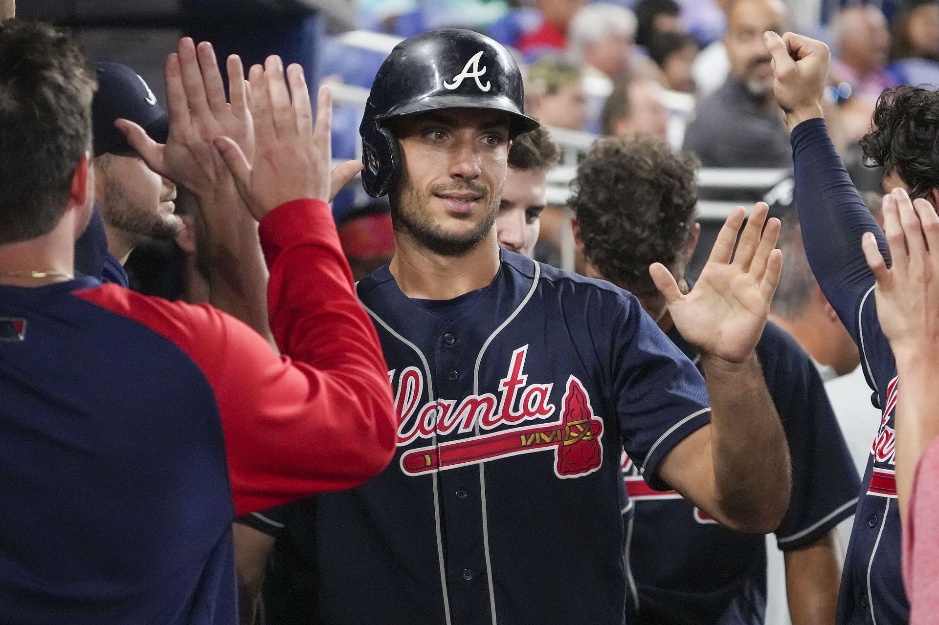 Matt Olson celebrates with teammates following a home run during a MLB Atlanta Braves v Miami Marlins game.